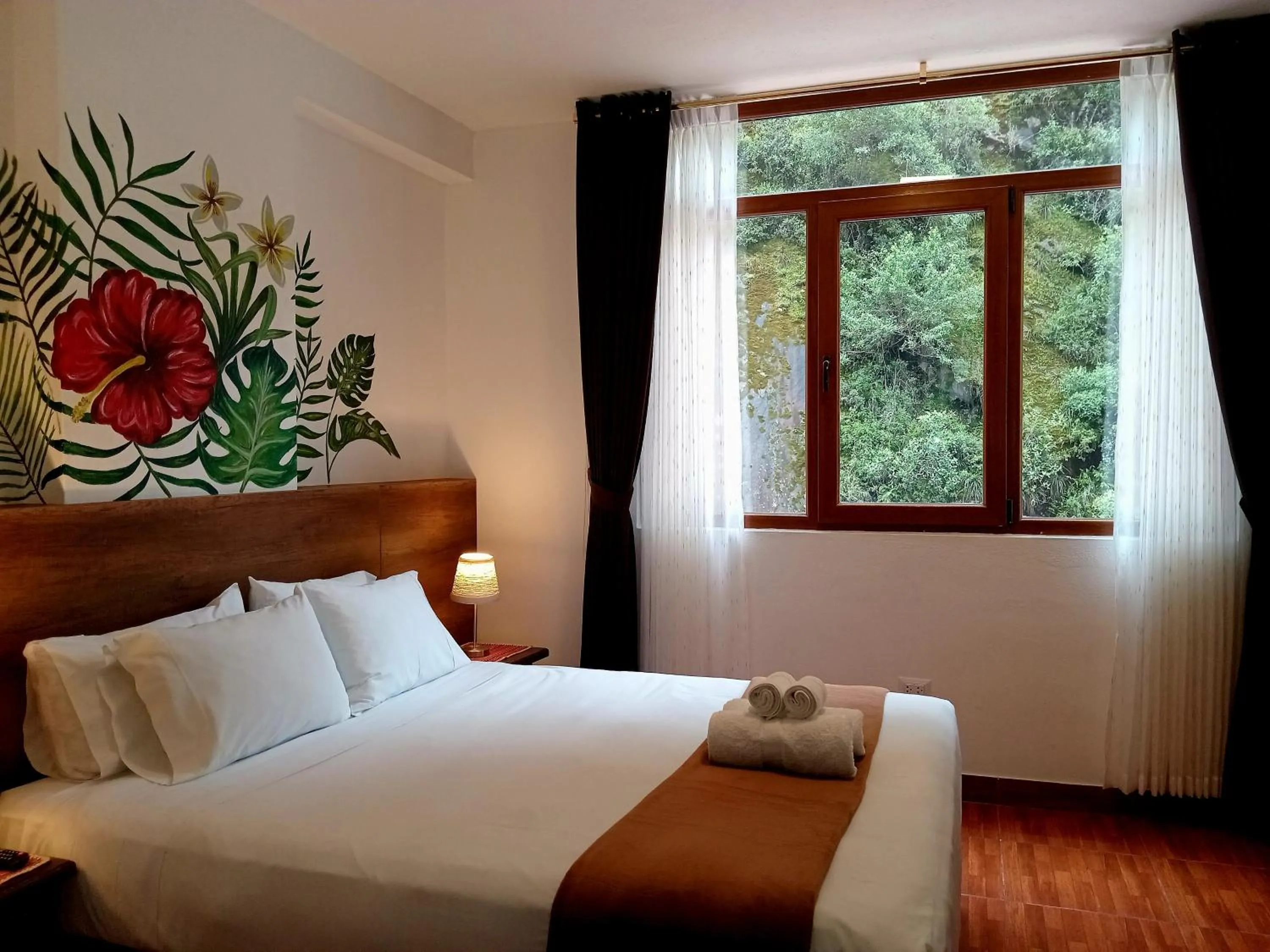 Bed in Susanna Inn MachuPicchu Hotel