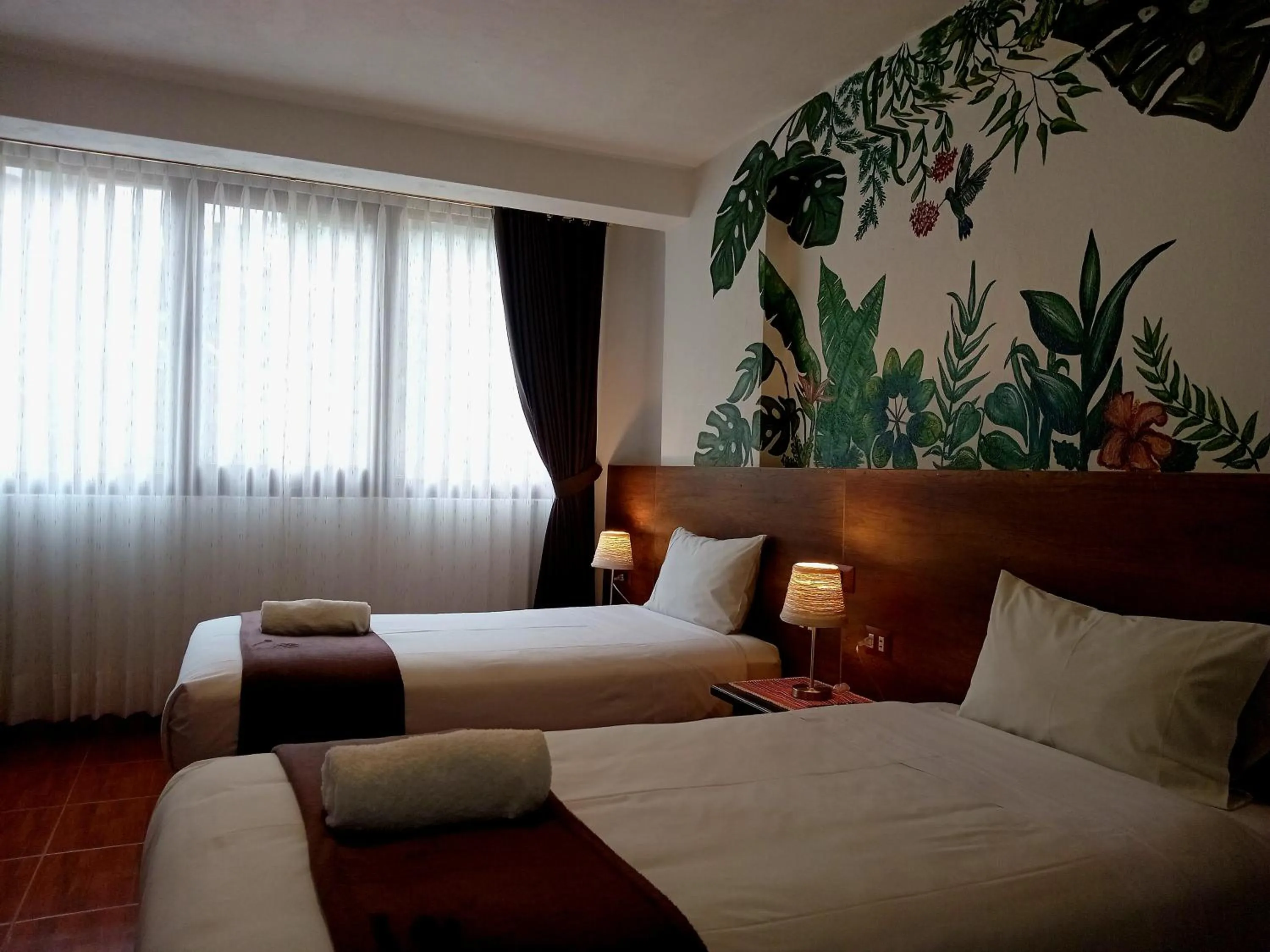 Bed in Susanna Inn MachuPicchu Hotel