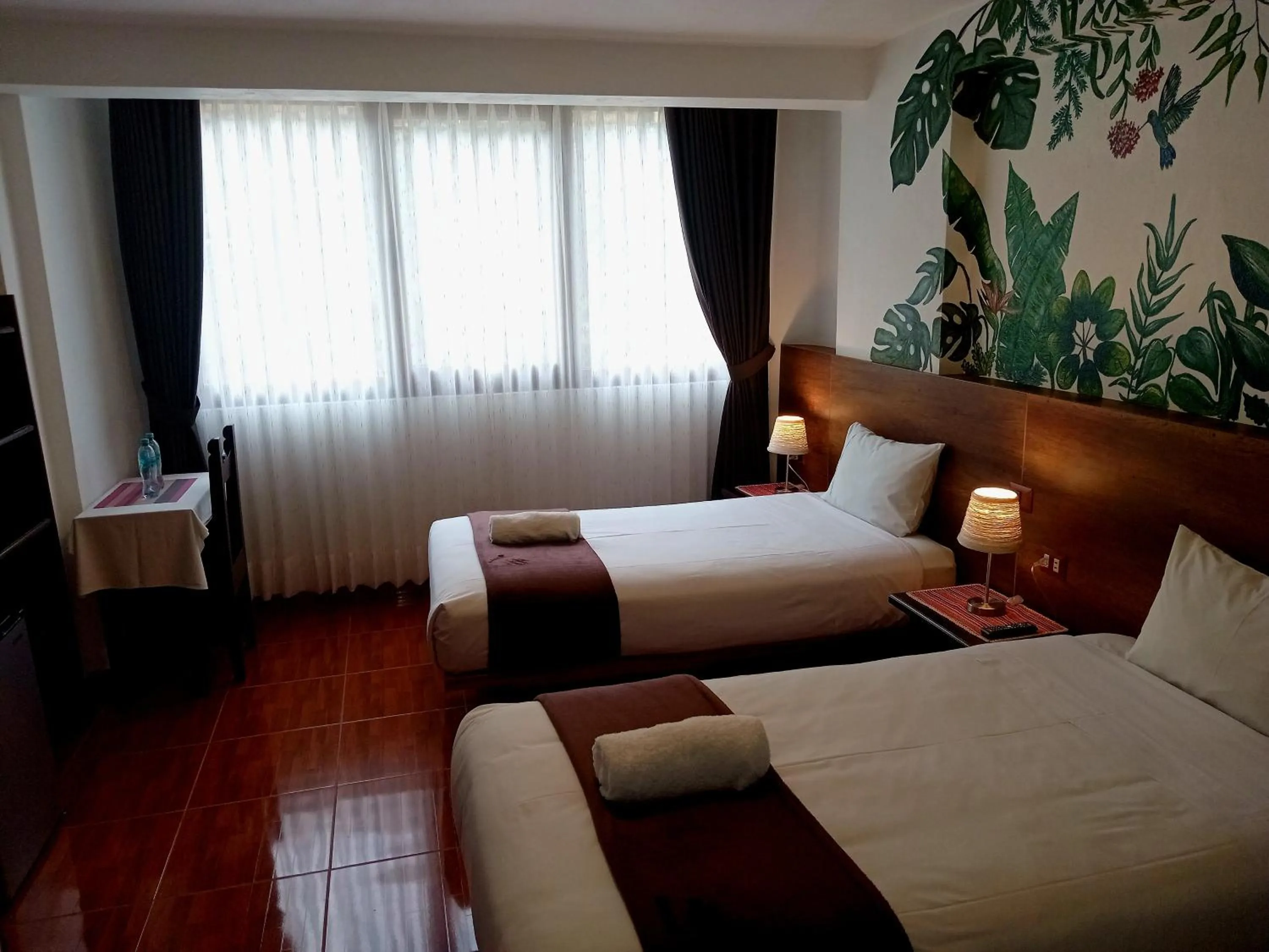 Bed in Susanna Inn MachuPicchu Hotel