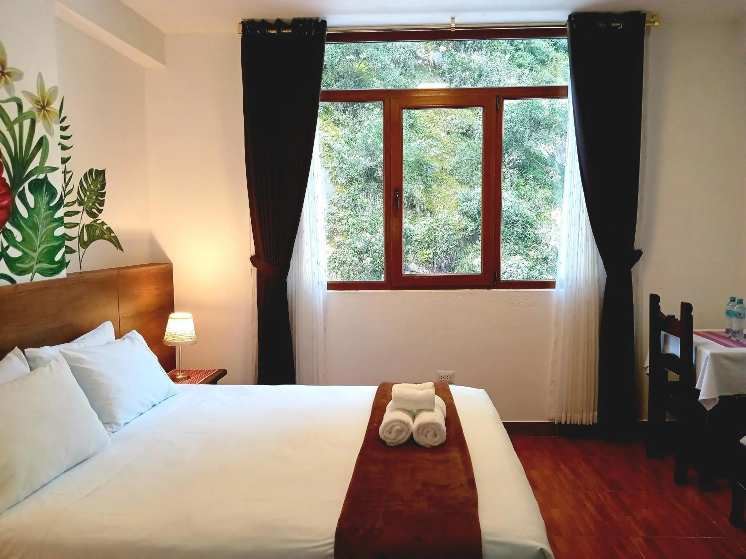 Bed in Susanna Inn MachuPicchu Hotel