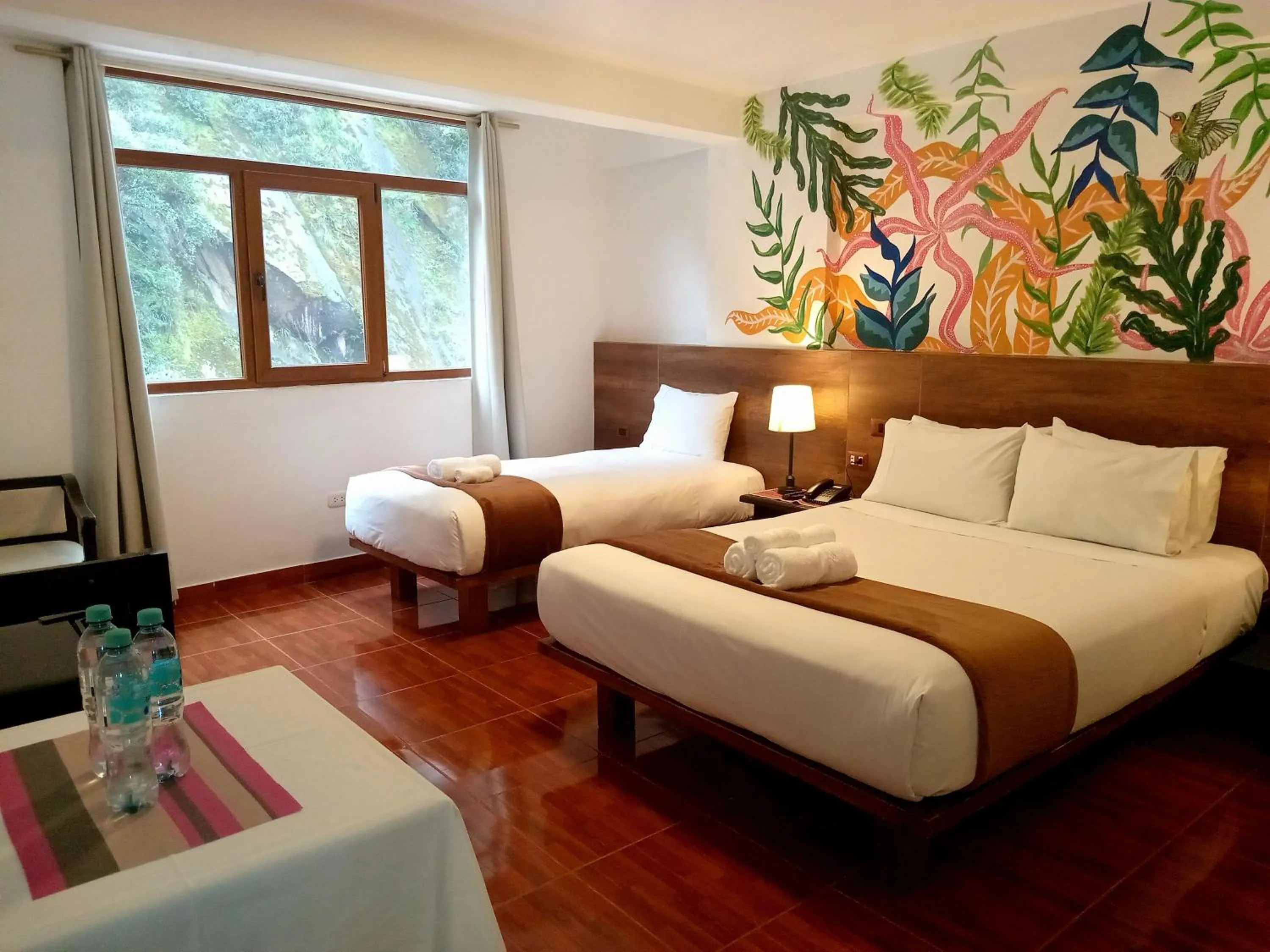 Bed in Susanna Inn MachuPicchu Hotel