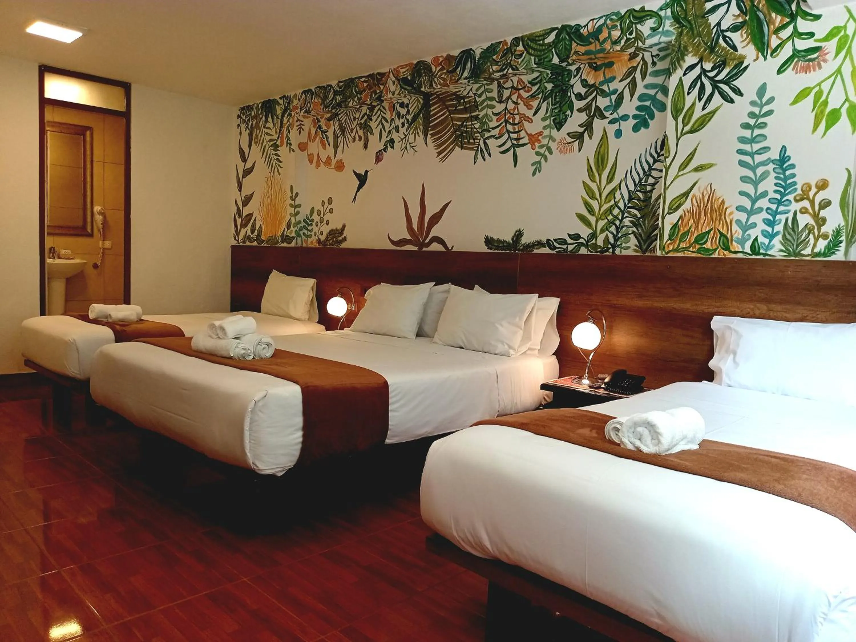 Bed in Susanna Inn MachuPicchu Hotel