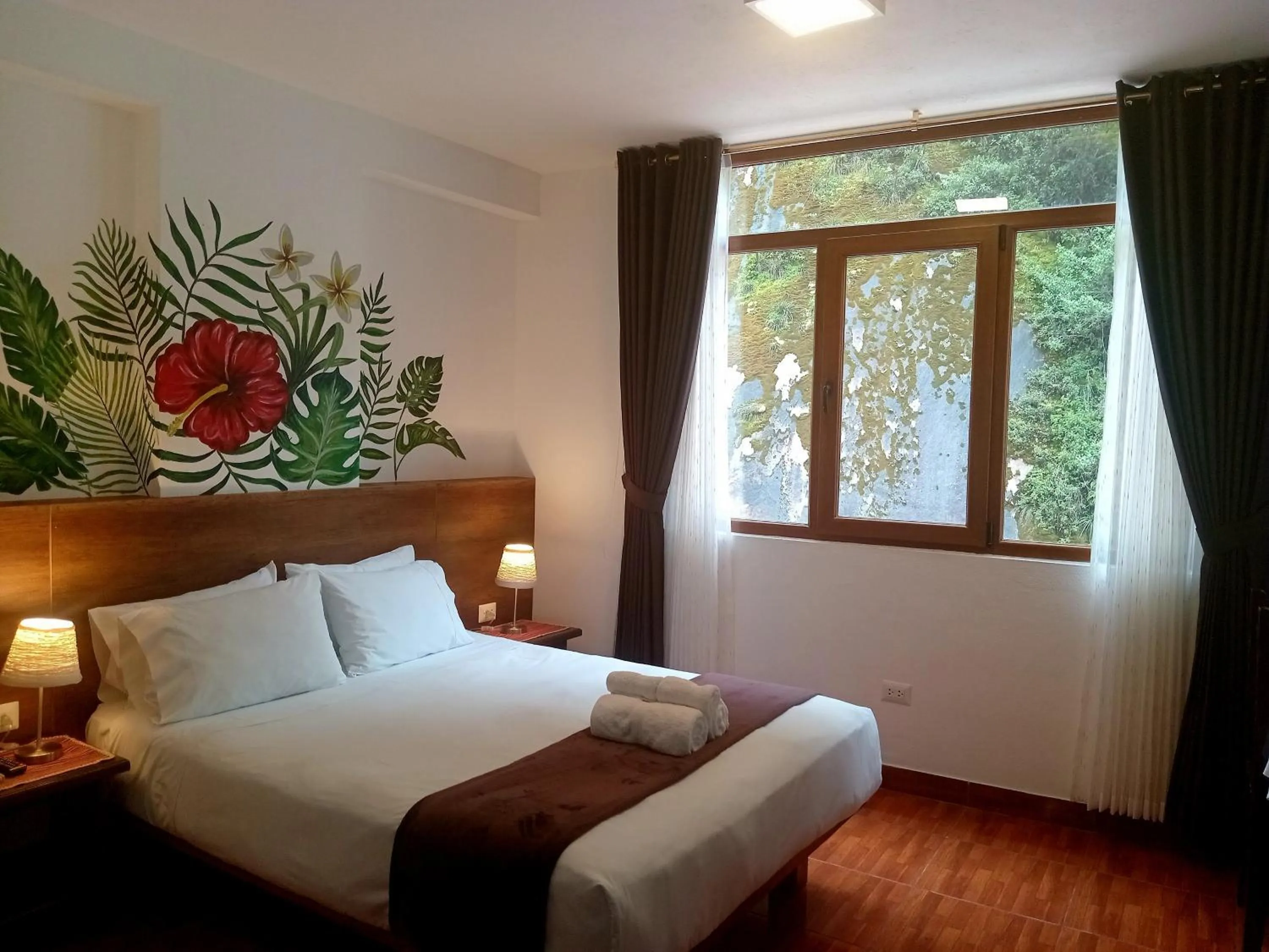 Bed in Susanna Inn MachuPicchu Hotel