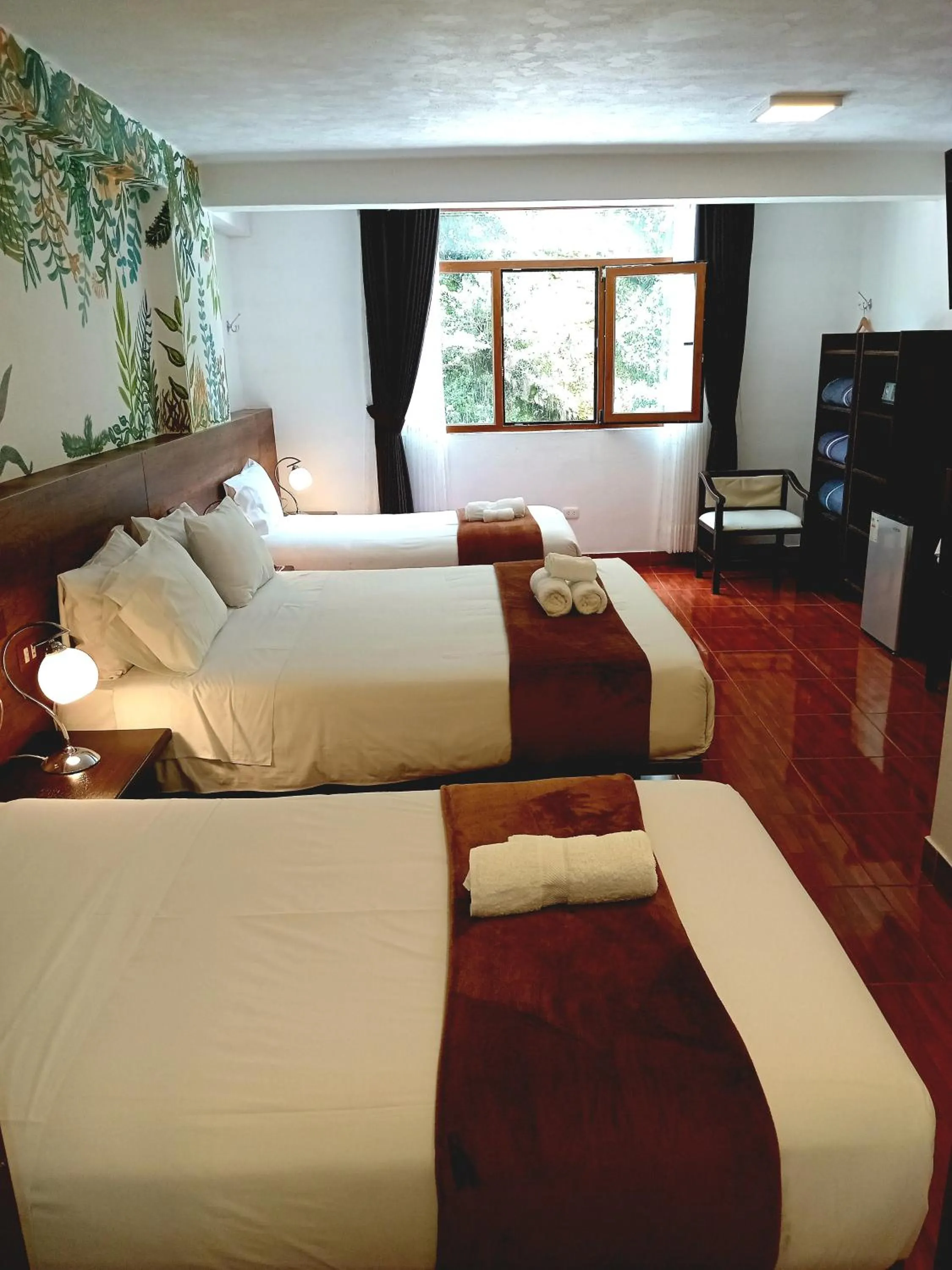 Bed in Susanna Inn MachuPicchu Hotel