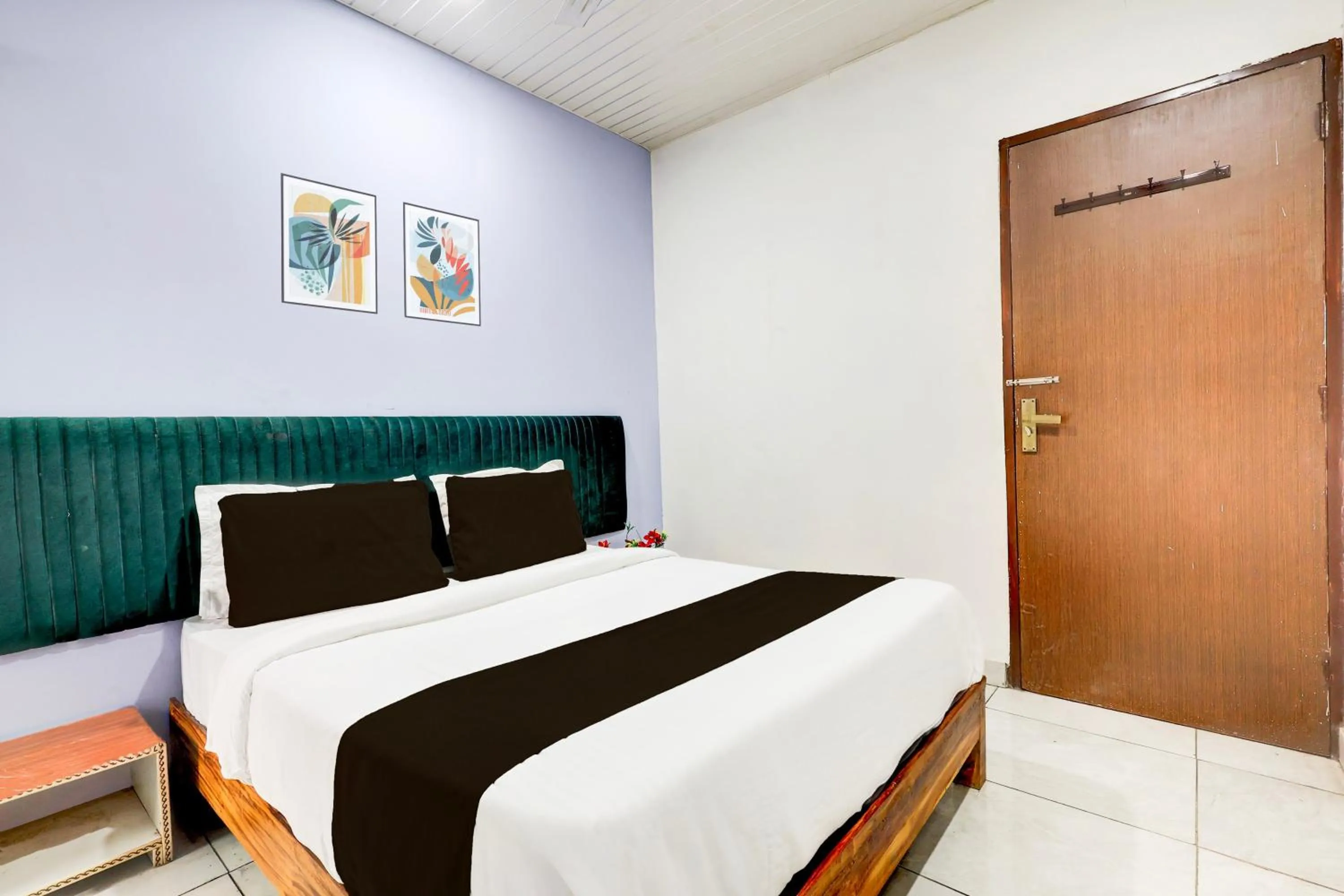 Bedroom, Bed in Super Hotel O Ambedkar Chowk Rewari formerly Hotel Shree