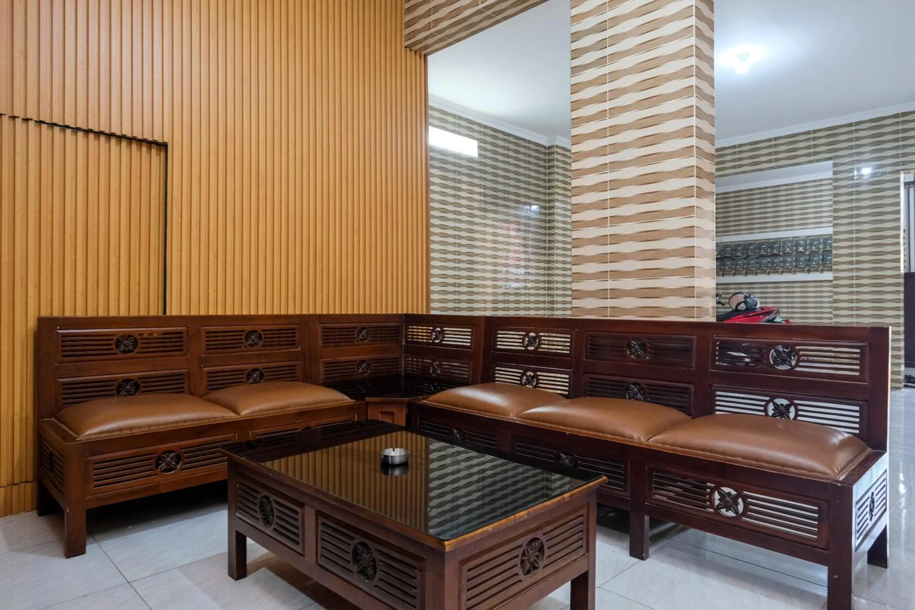 Seating area in RedDoorz Syariah near Stasiun Gubeng 2