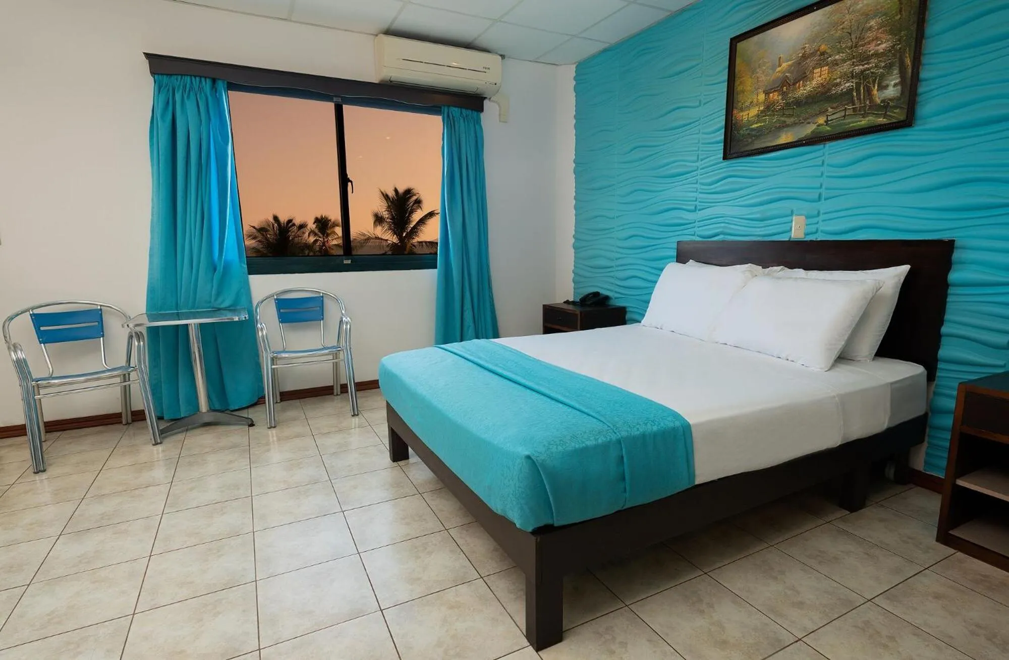 Bed in Hotel Puntarenas Beach