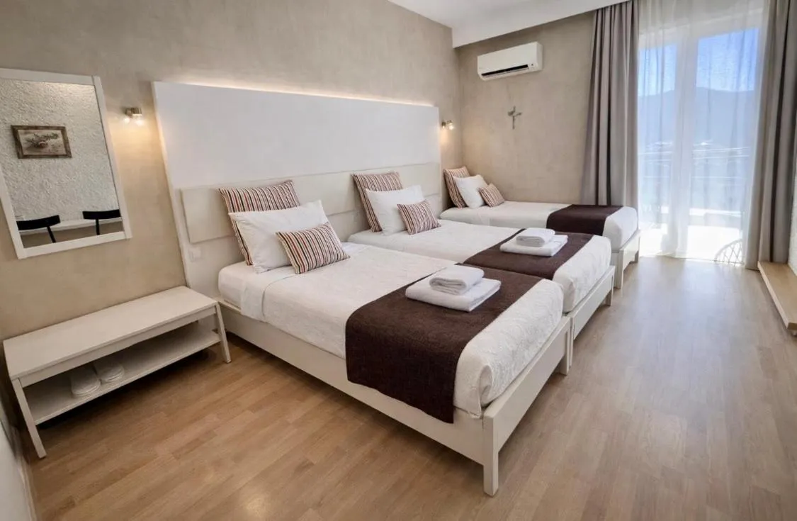 Bed in Nidimos Hotel