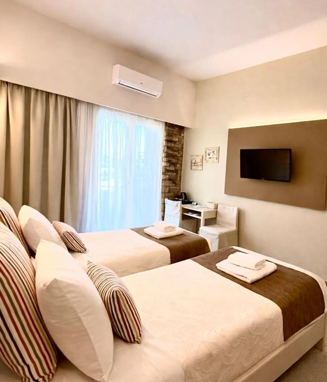 Bed in Nidimos Hotel