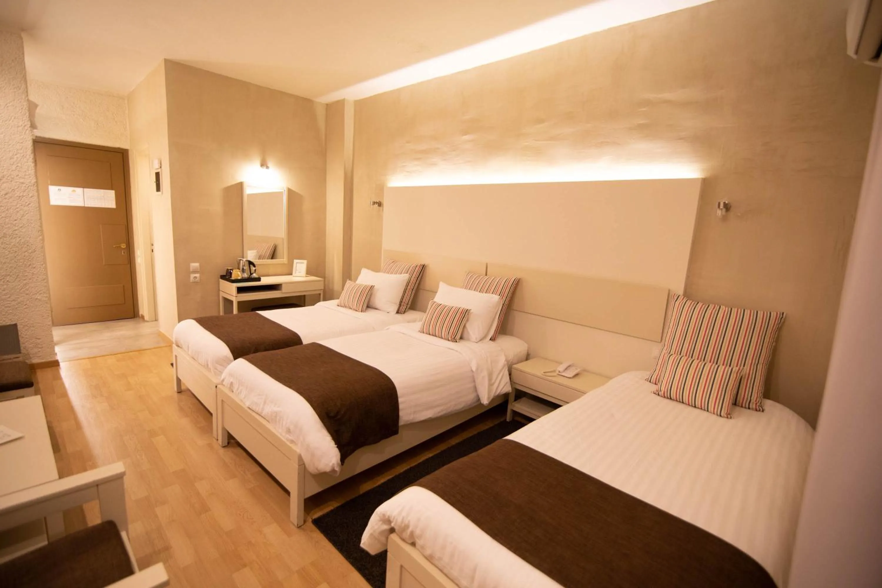 Bed in Nidimos Hotel