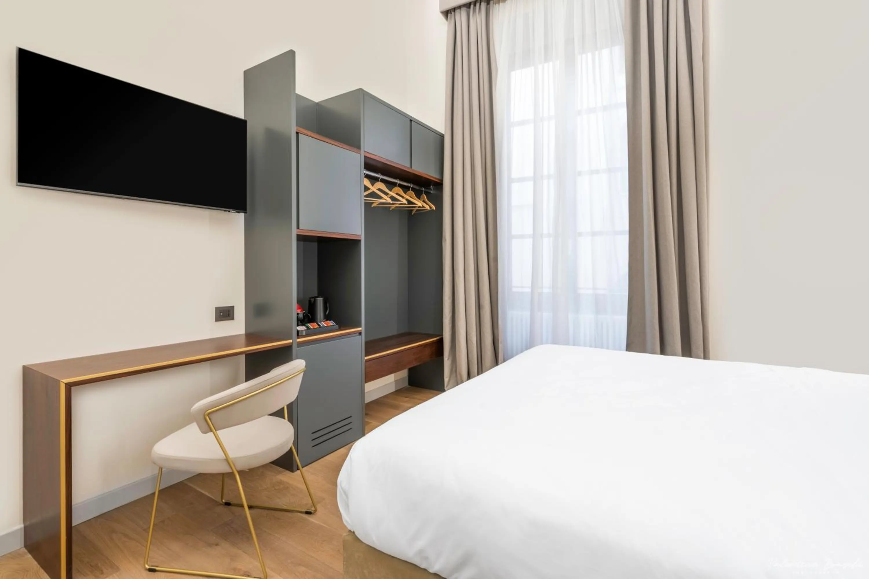 Bed in Hotel Adamas