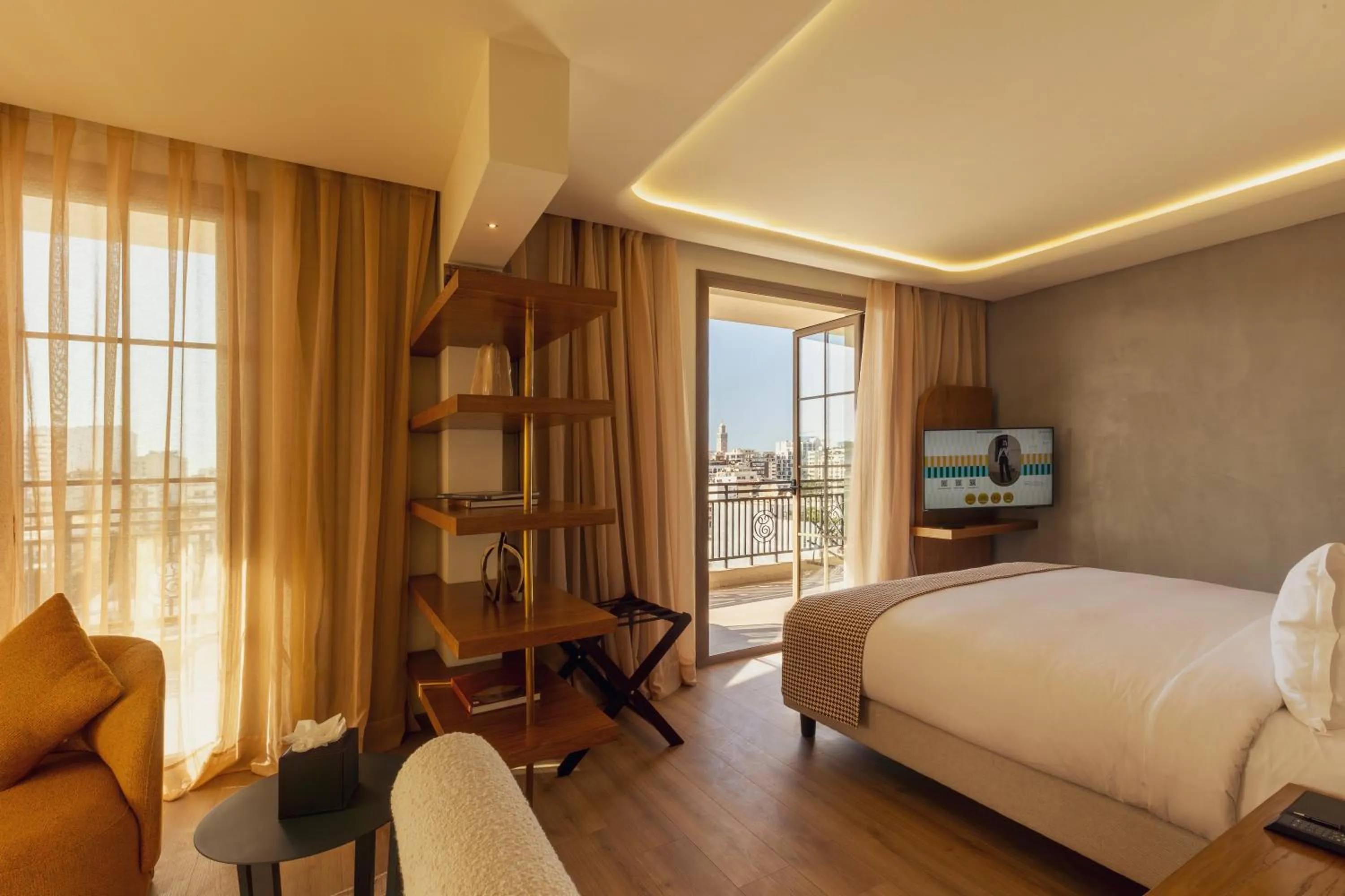 Communal lounge/ TV room, Bed in Le Square By Onomo Collection