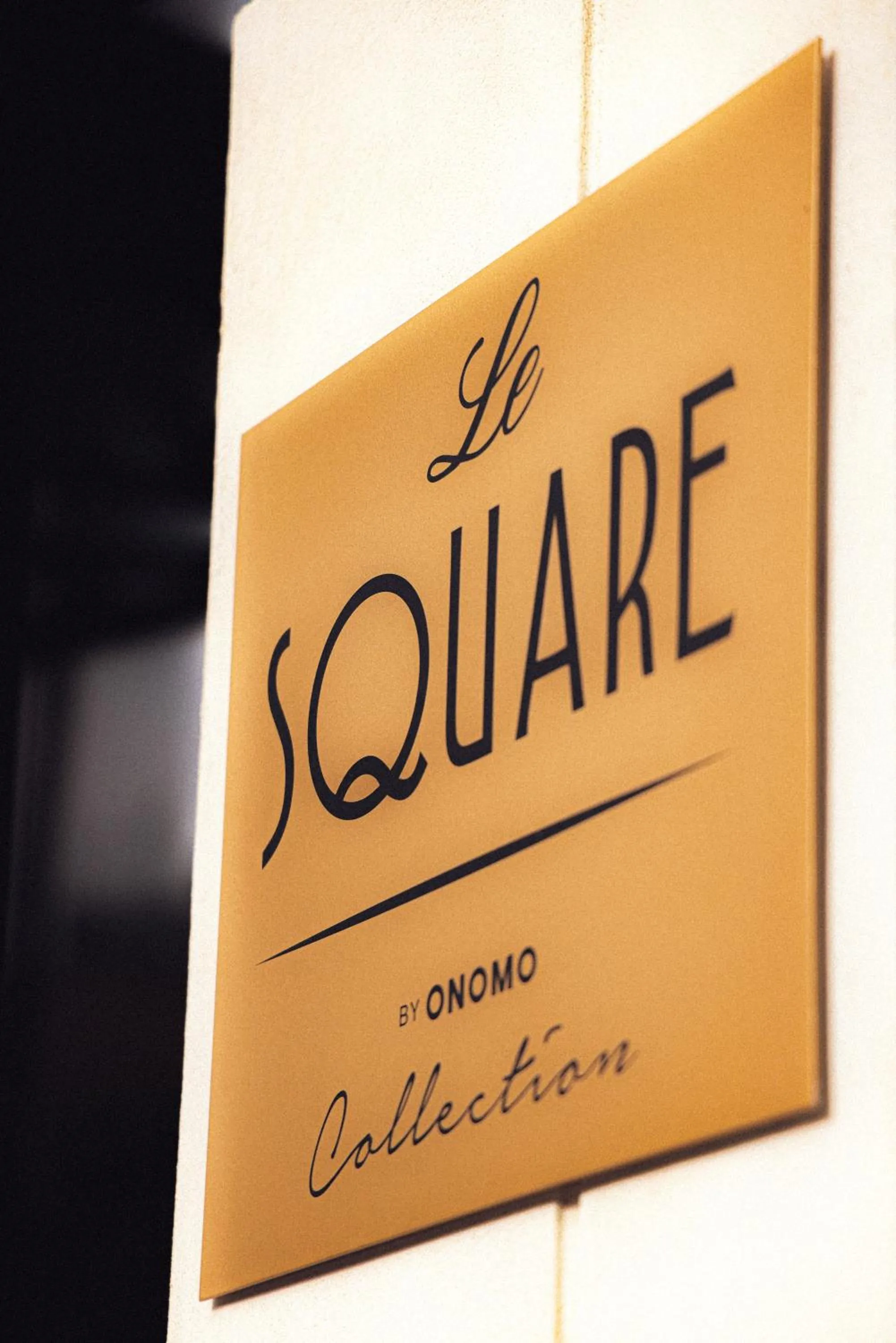 Property logo or sign in Le Square By Onomo Collection