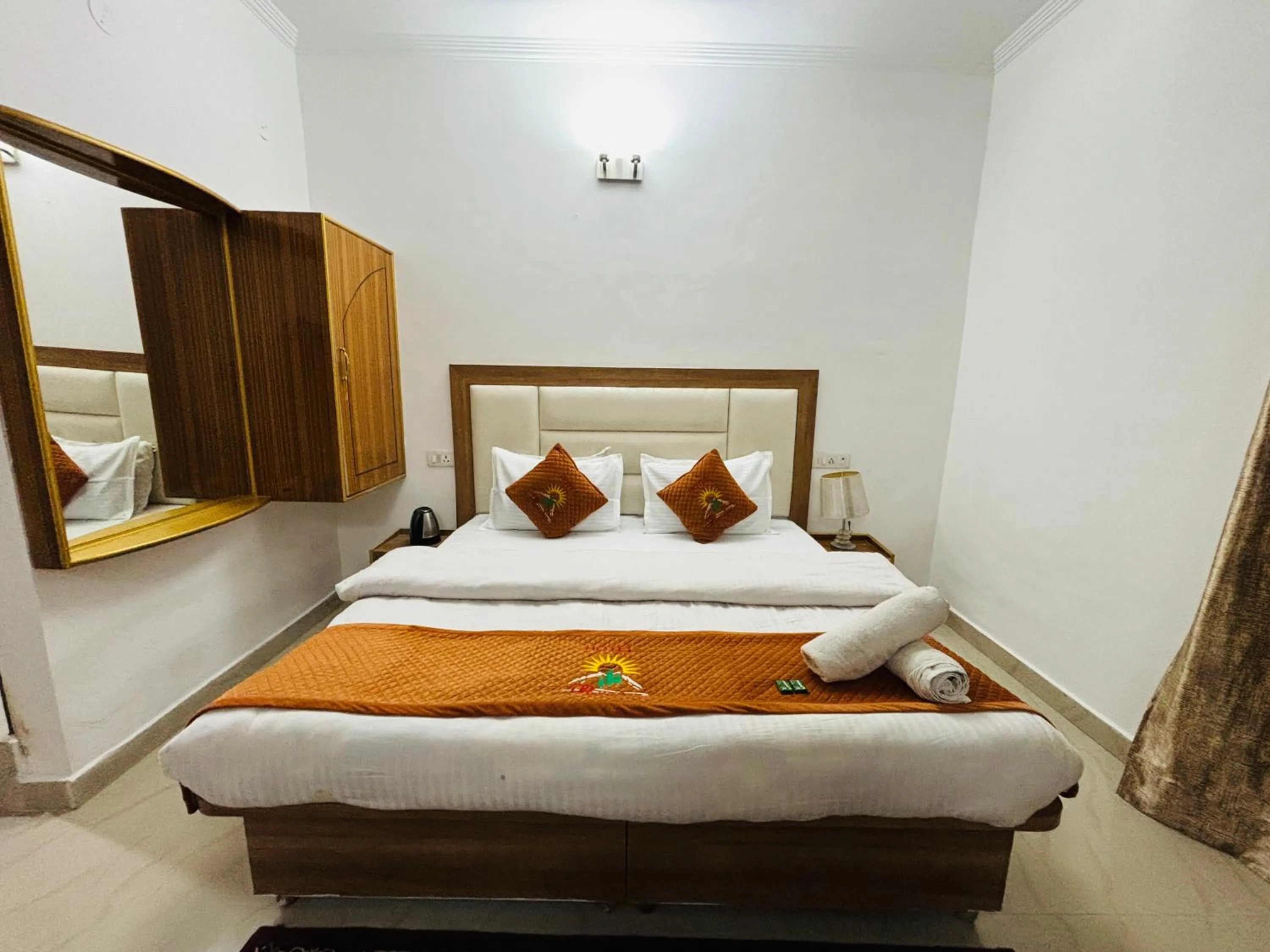 Bed in Hotel Kumar Residency