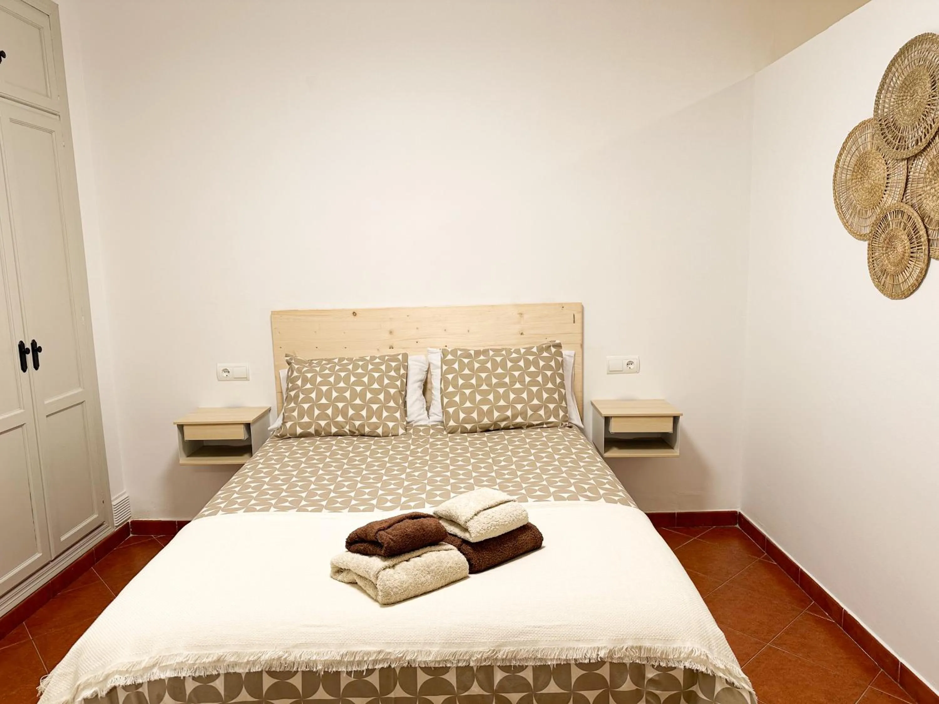 Bed in La Cala Beach Apartment