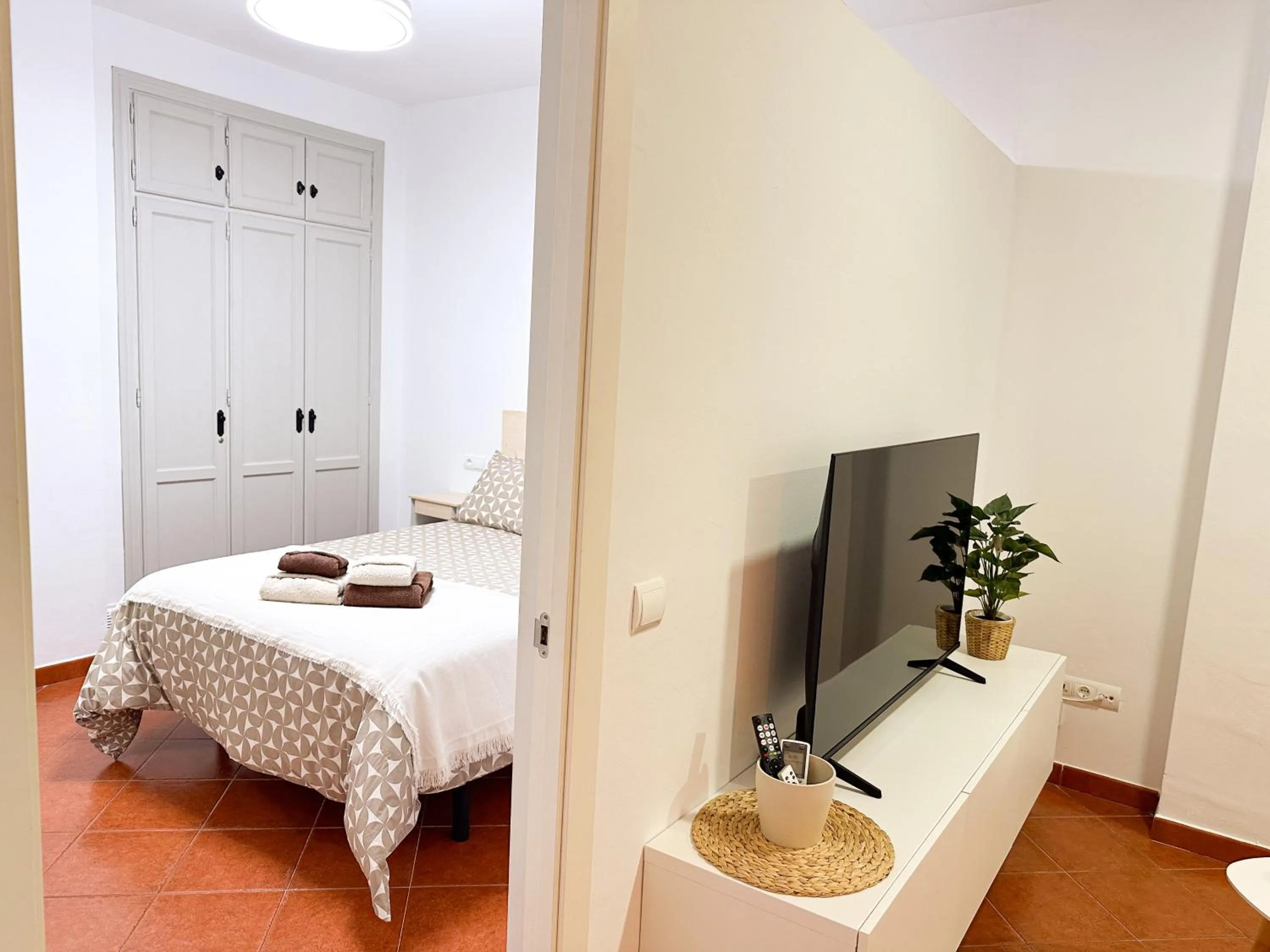 Bed in La Cala Beach Apartment