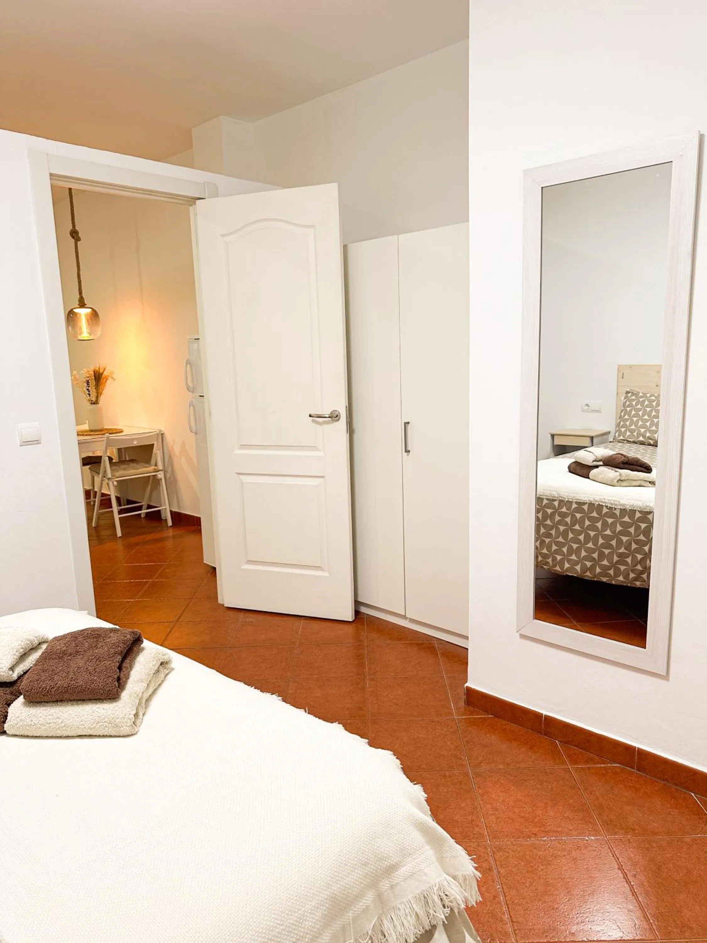 Bed in La Cala Beach Apartment
