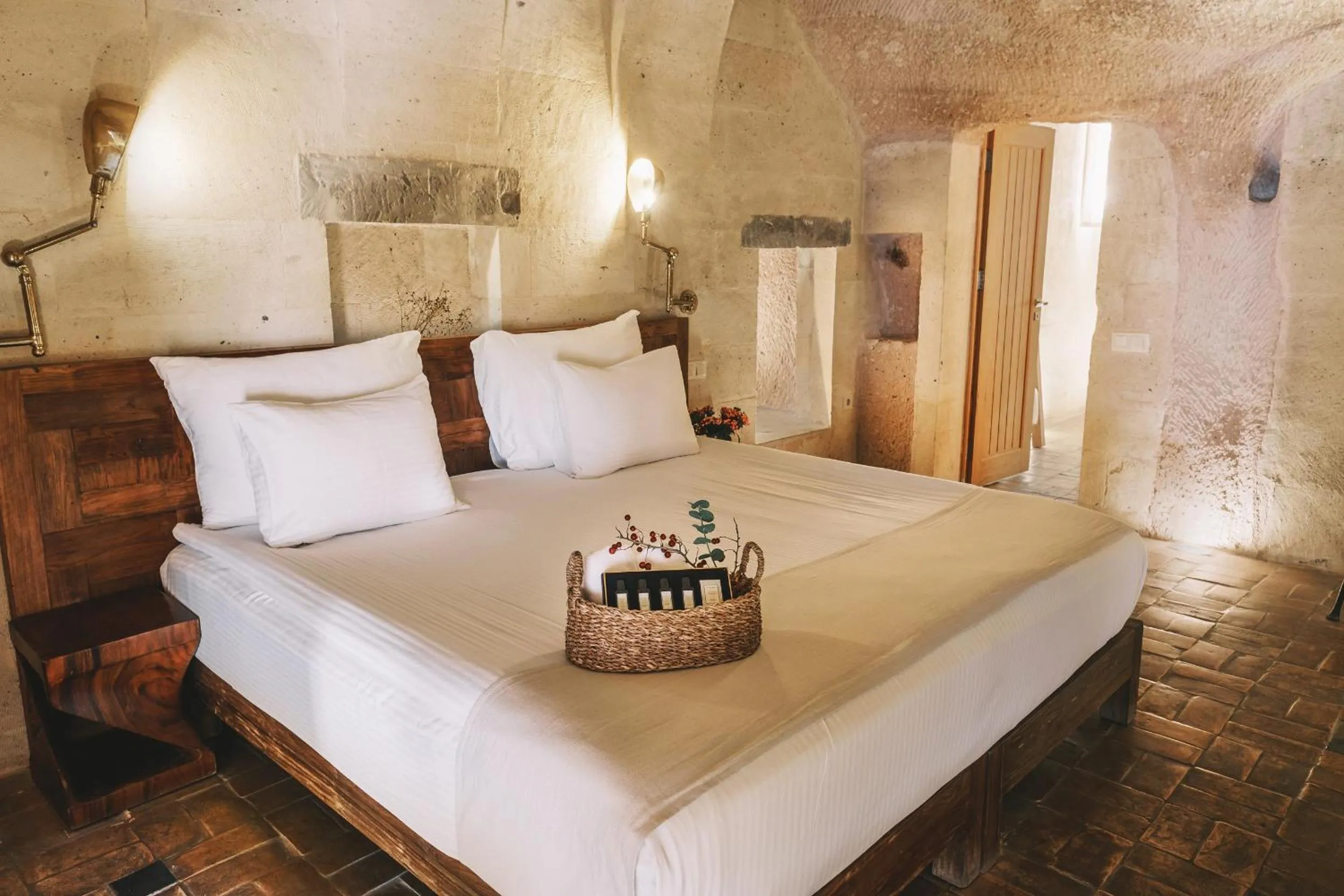 Bed in Millstone Cave Suites Hotel