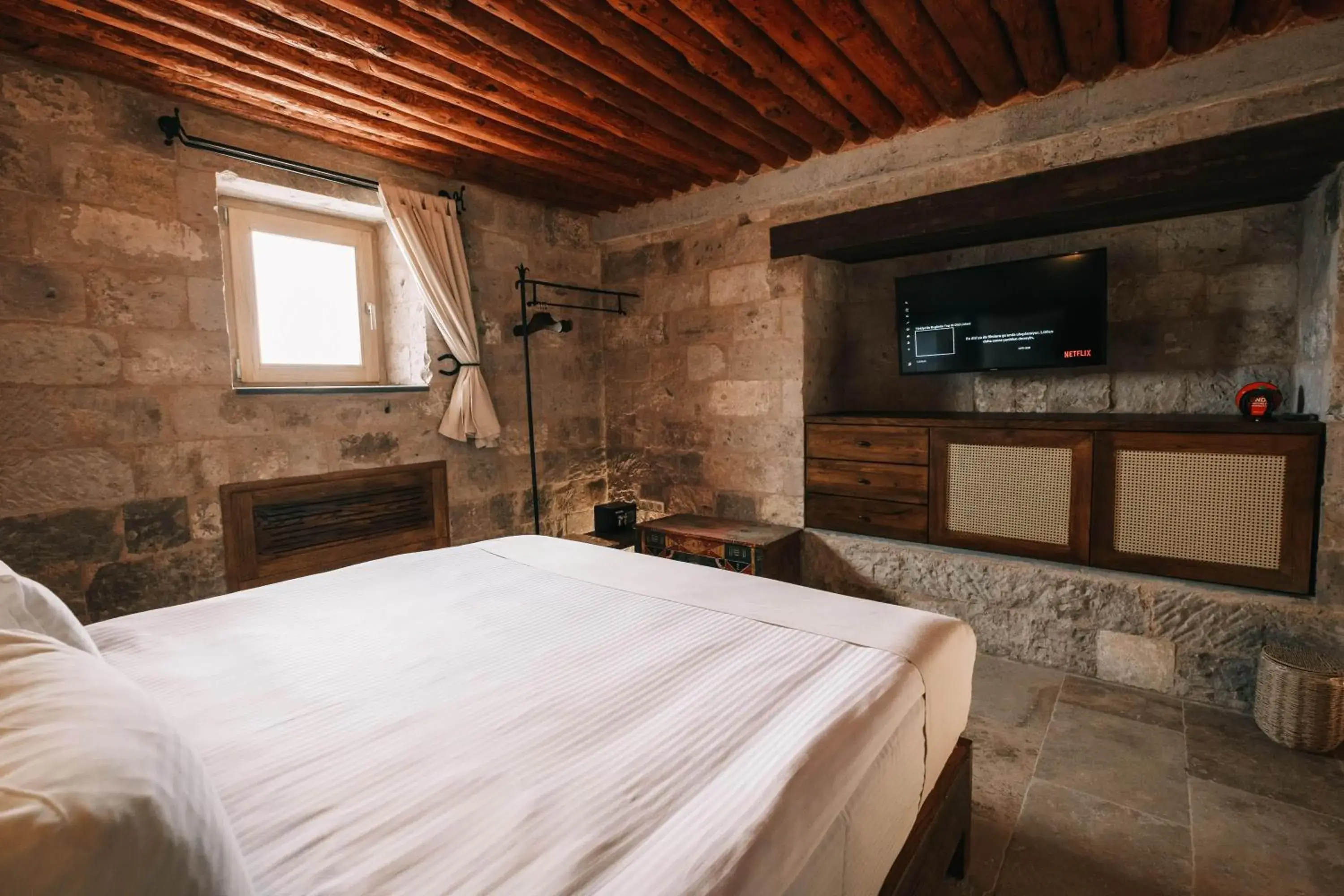 Photo of the whole room, Bed in Millstone Cave Suites Hotel Photo of the whole room, Bed in Millstone Cave Suites Hotel