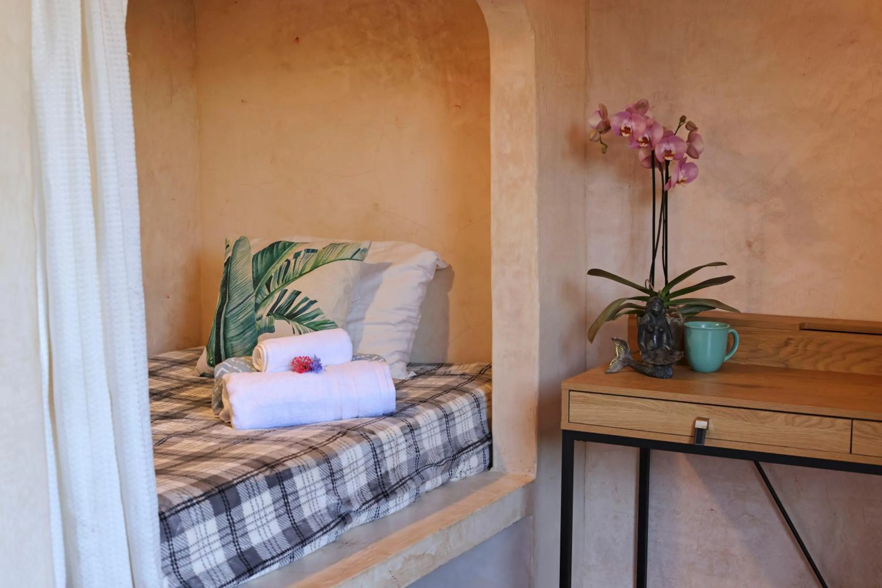 Bed in Nomada Wellness Hotel