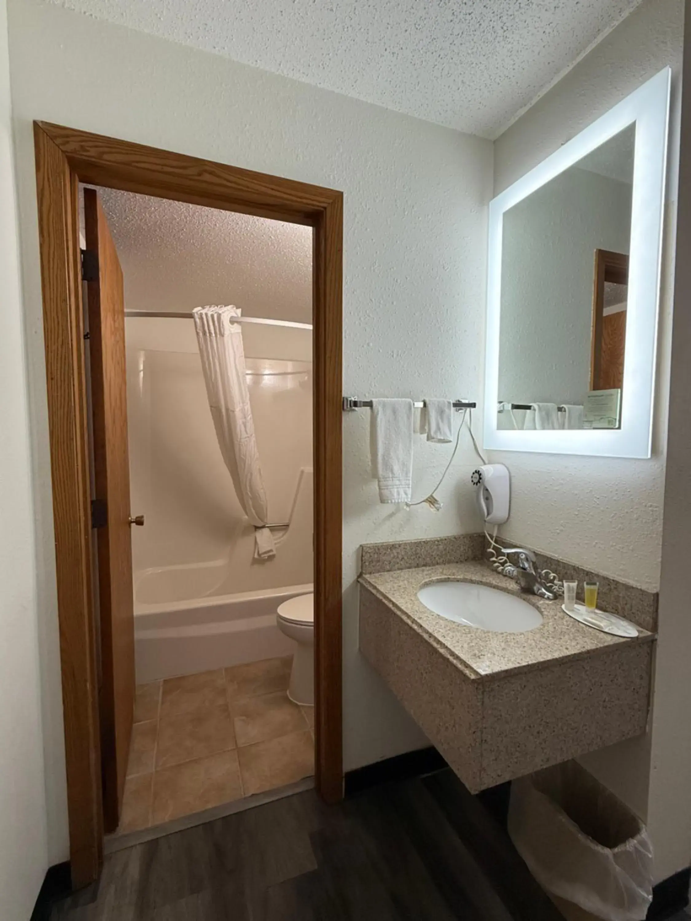 Bathroom in Super 8 by Wyndham West Fargo Main Ave ND Bathroom in Super 8 by Wyndham West Fargo Main Ave ND