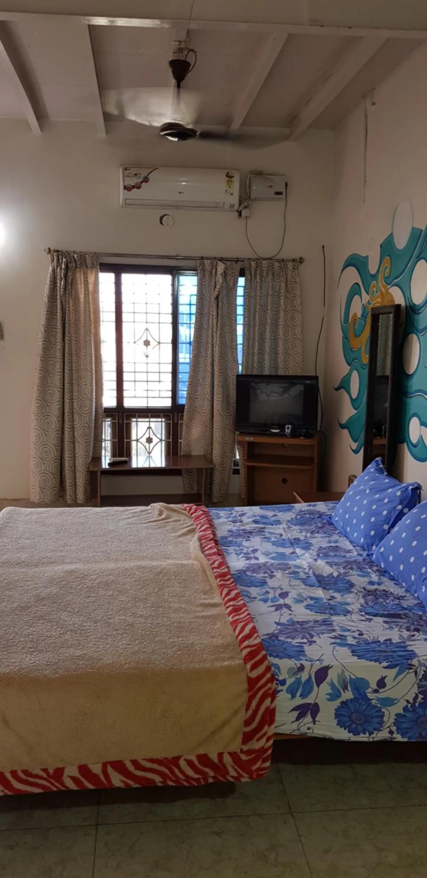 Bed in Padmaa Hampi Villa
