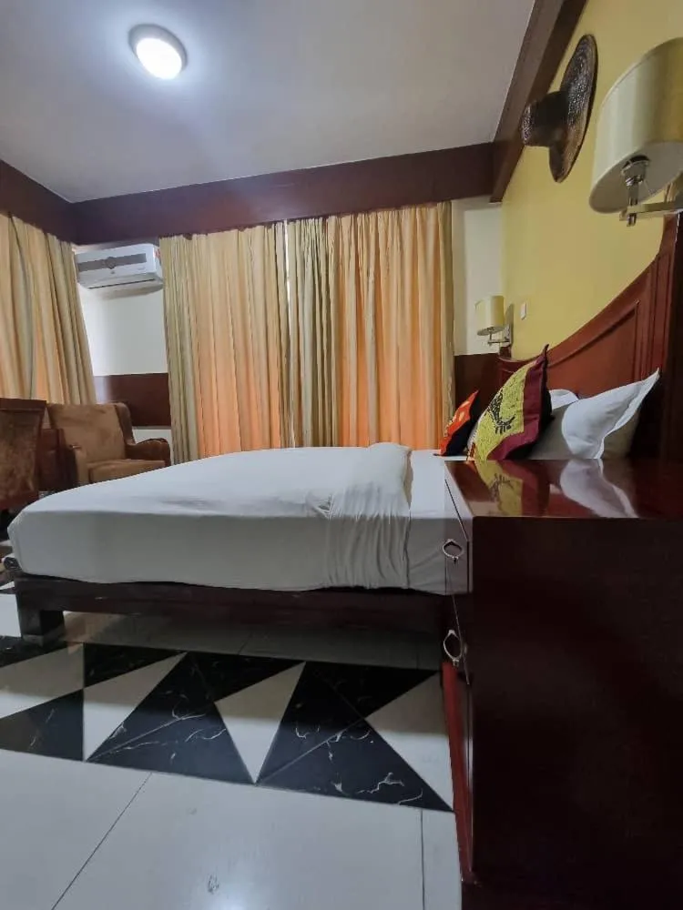 Bed in Peacock Hotel