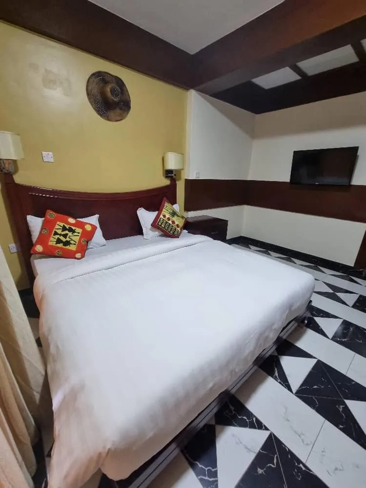 Bed in Peacock Hotel