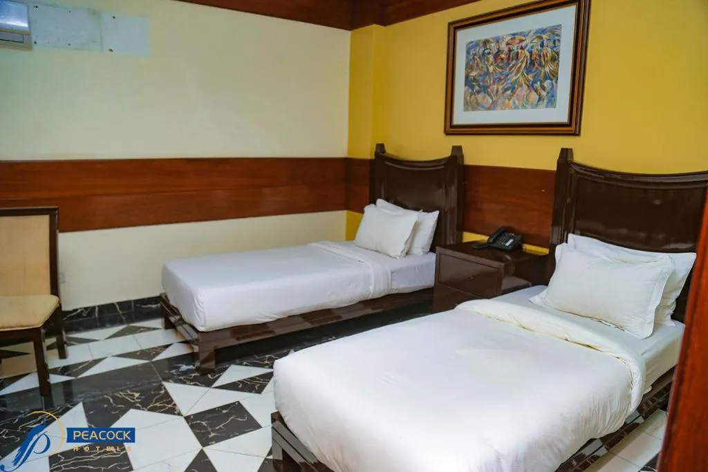 Bedroom in Peacock Hotel