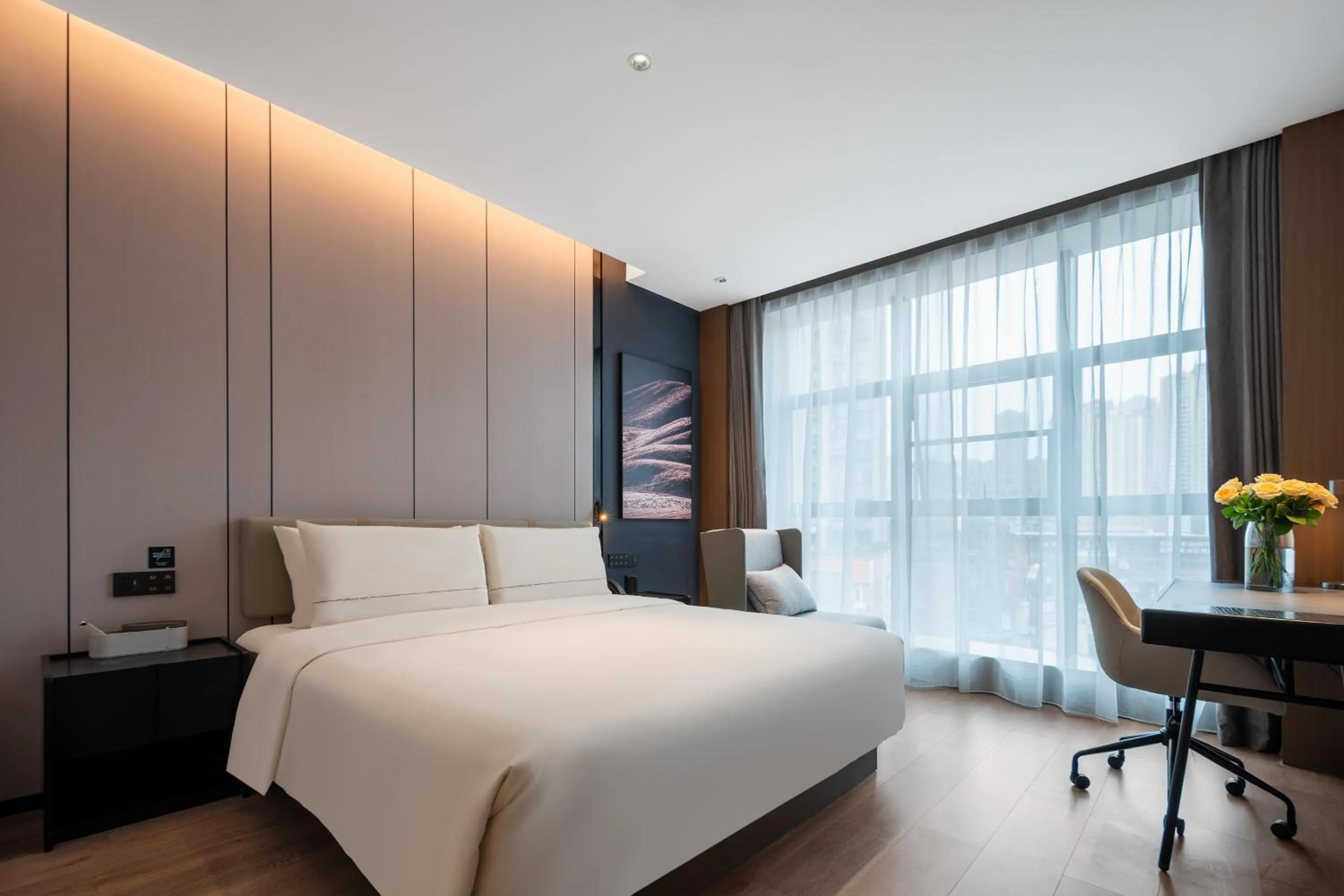Bed in Atour Hotel Chongqing Jiangbei Airport Huanshan Park