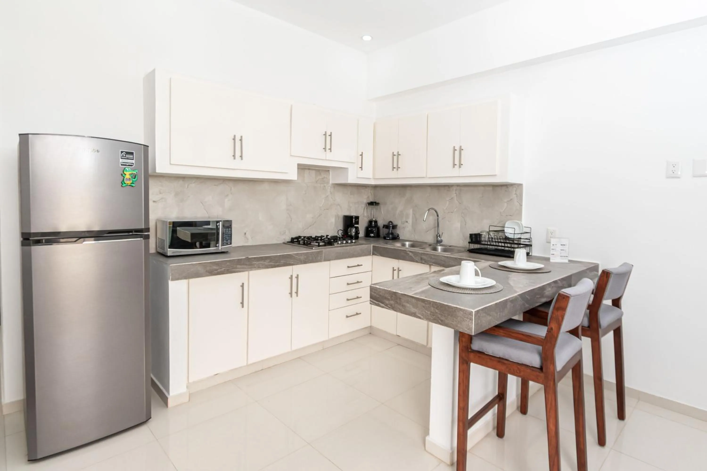 kitchen in Safiro Suites Guayabitos Apartments - Adults Only