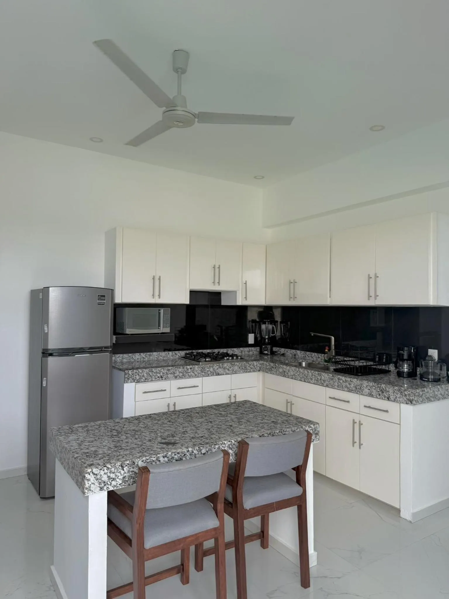 Kitchen or kitchenette in Safiro Suites Guayabitos Apartments - Adults Only
