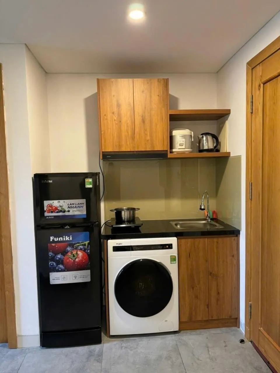 Kitchen or kitchenette in DOMA by HSuites Hotel & Apartment
