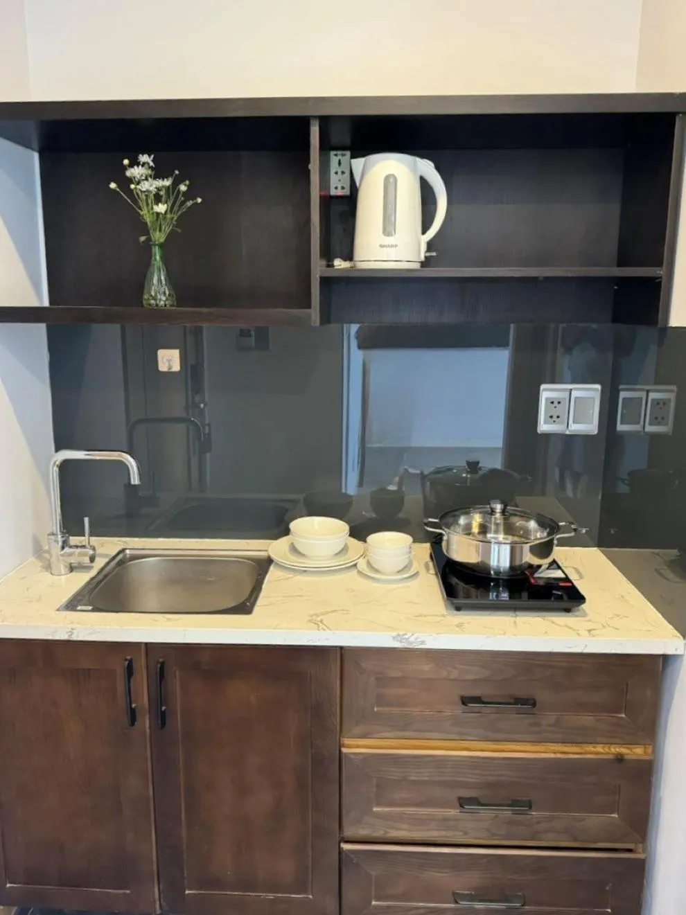 Kitchen or kitchenette in DOMA by HSuites Hotel & Apartment