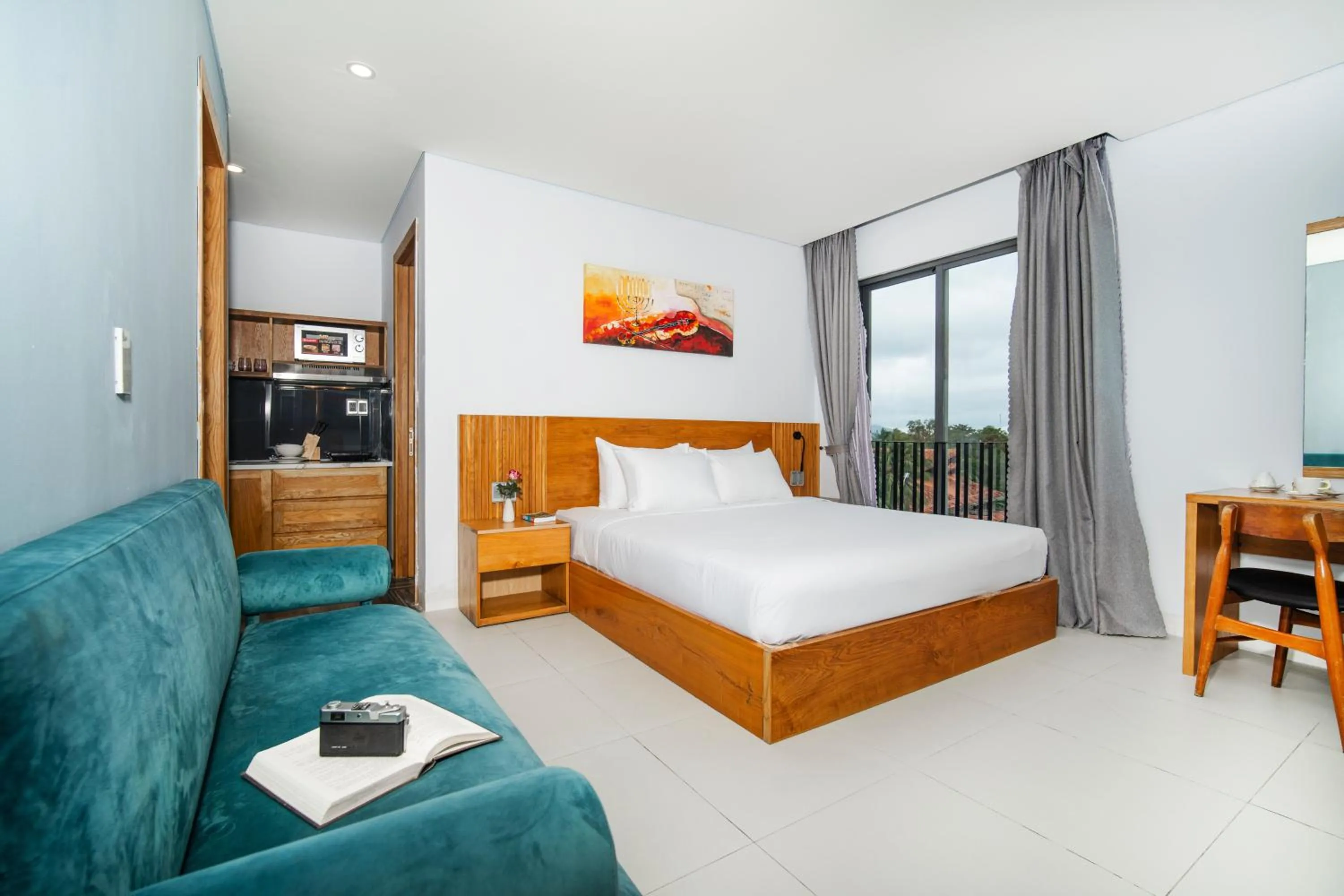 Seating area, Bed in DOMA by HSuites Hotel & Apartment