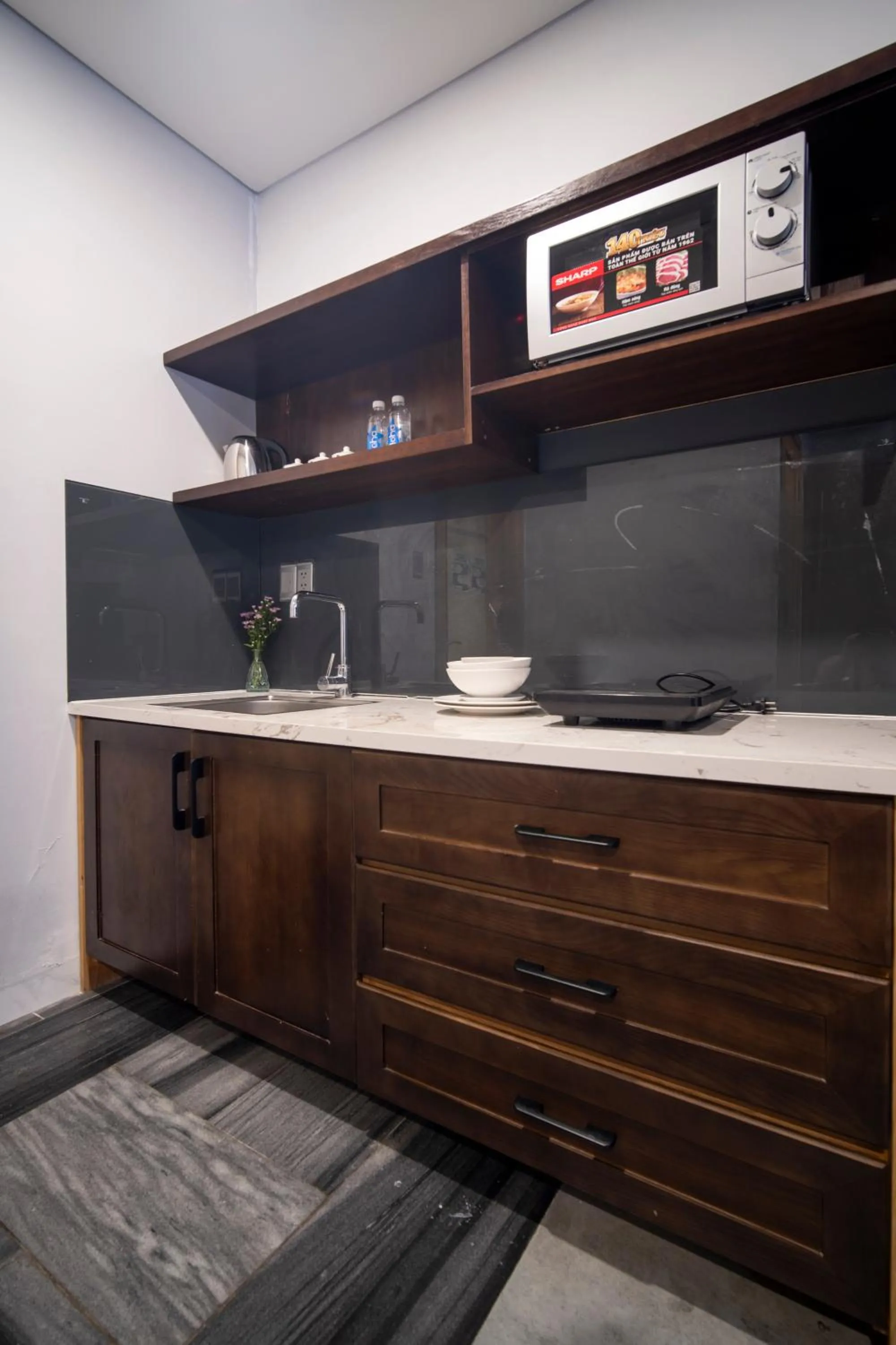 Kitchen or kitchenette, Bed in DOMA by HSuites Hotel & Apartment