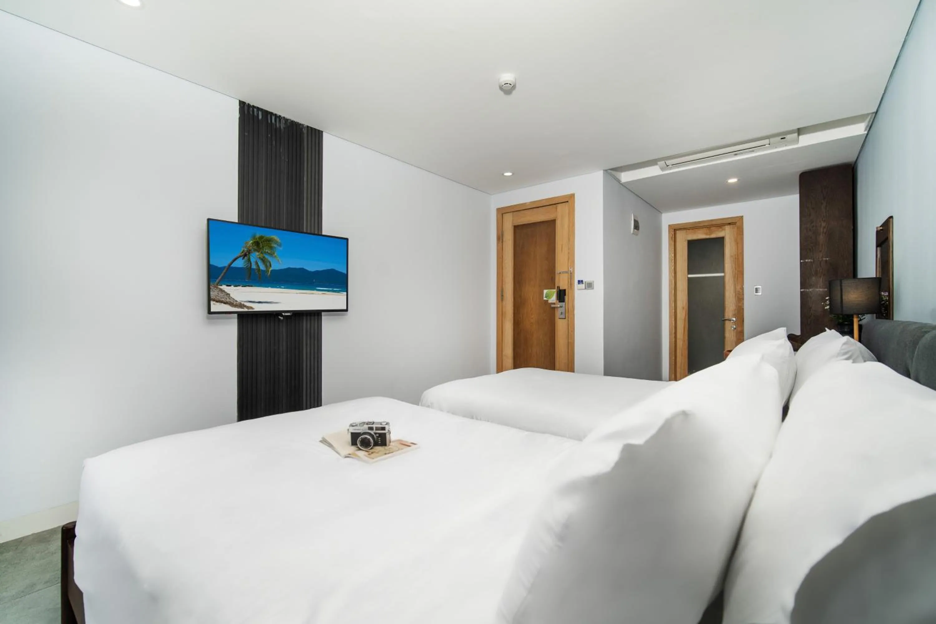 Bed in DOMA by HSuites Hotel & Apartment
