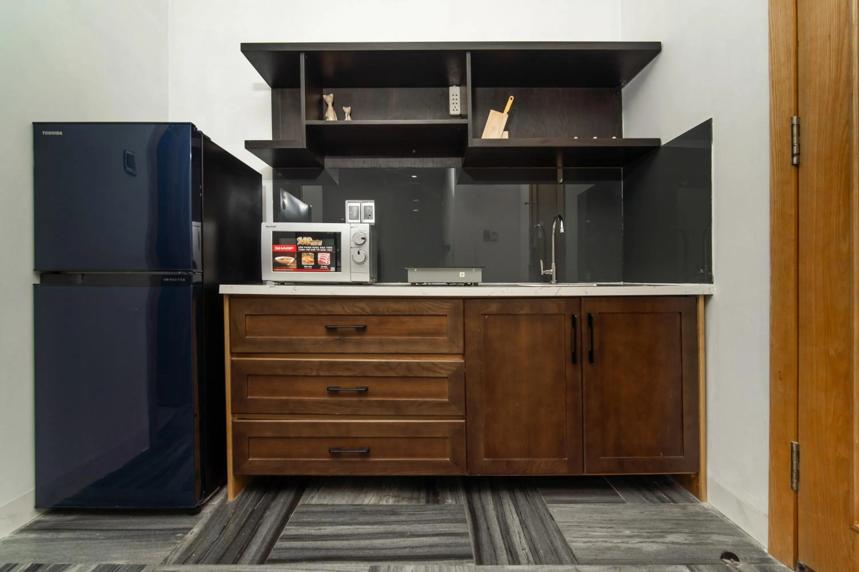Kitchen or kitchenette in DOMA by HSuites Hotel & Apartment