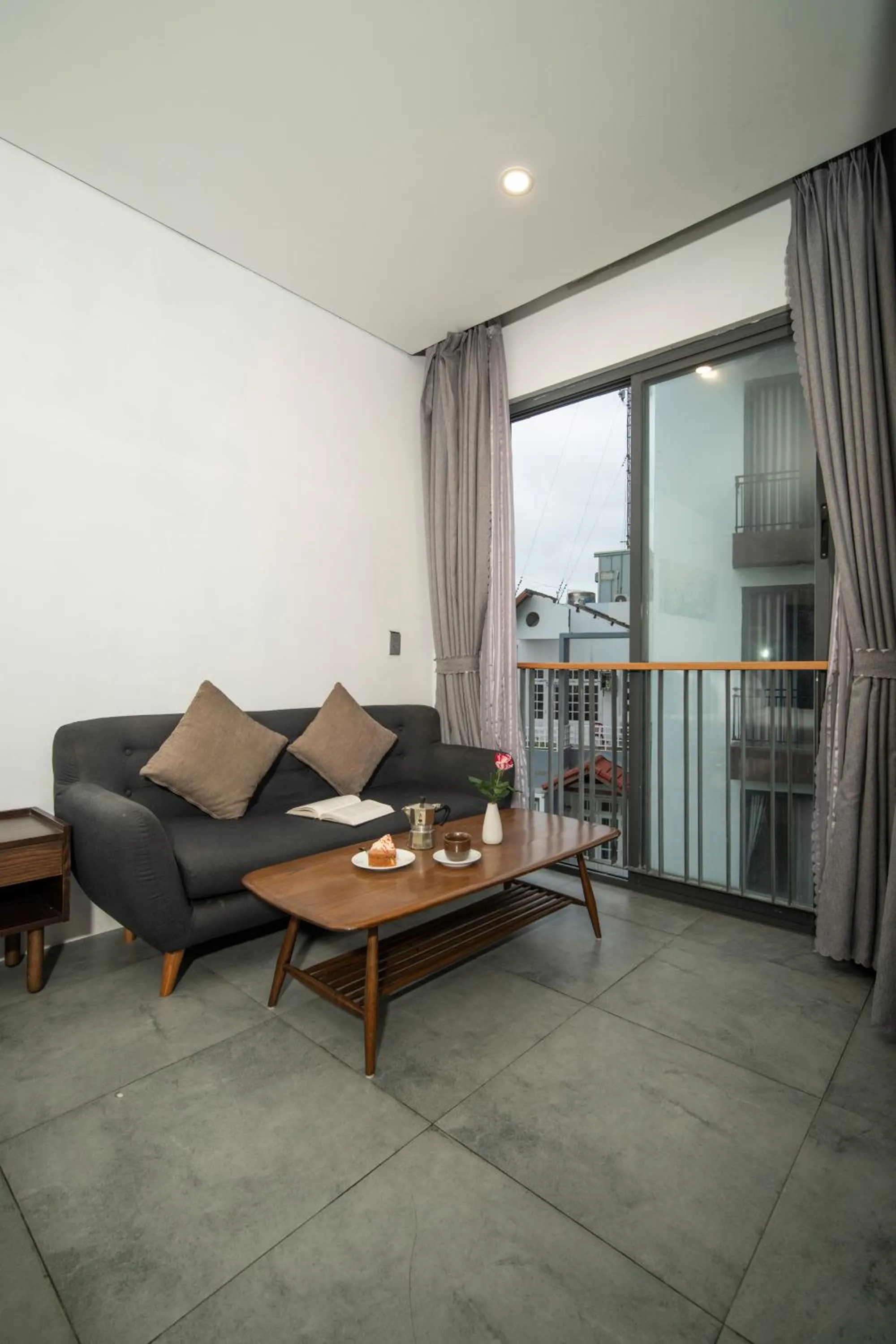 Seating area in DOMA by HSuites Hotel & Apartment