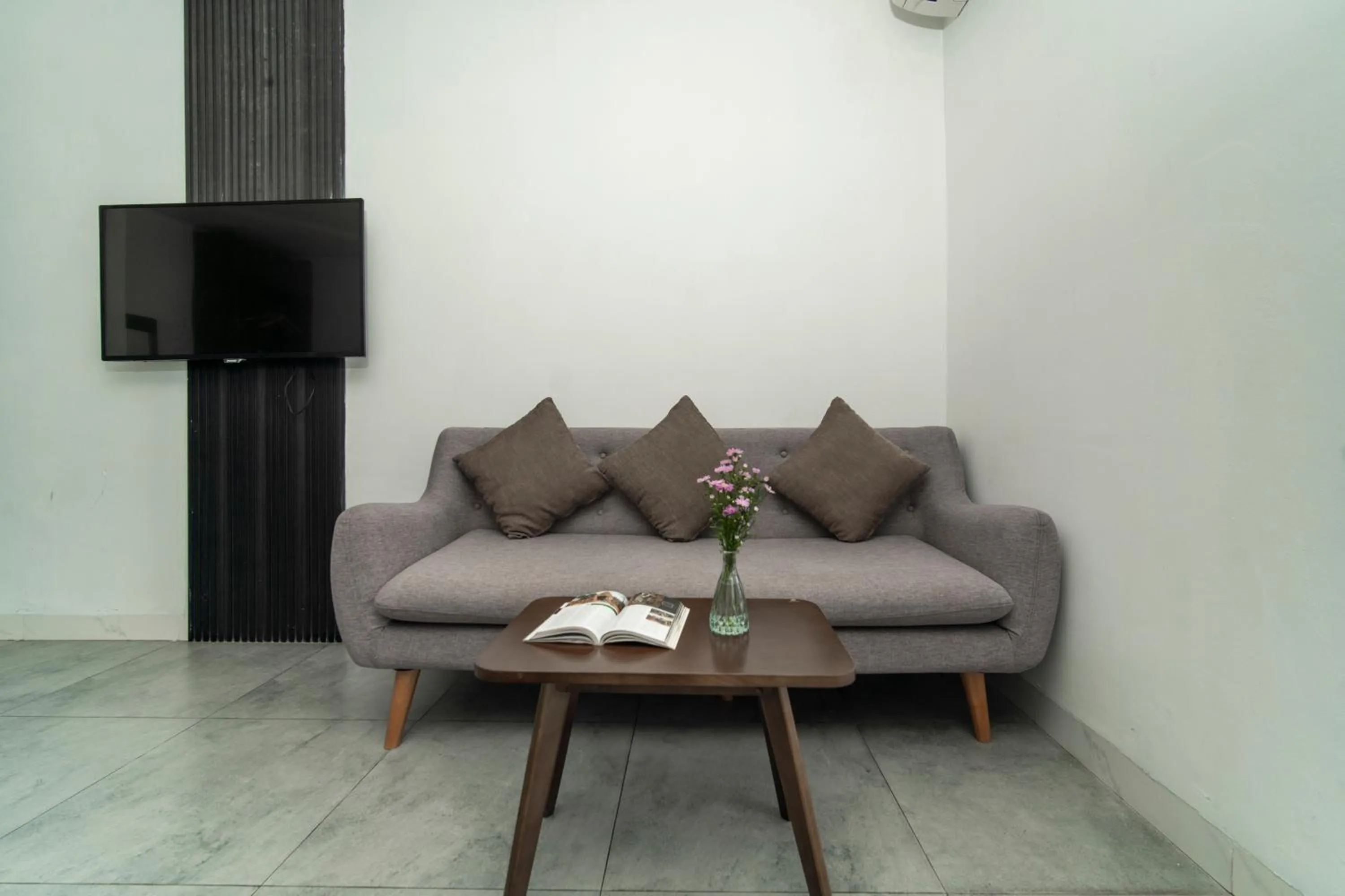 Seating area in DOMA by HSuites Hotel & Apartment