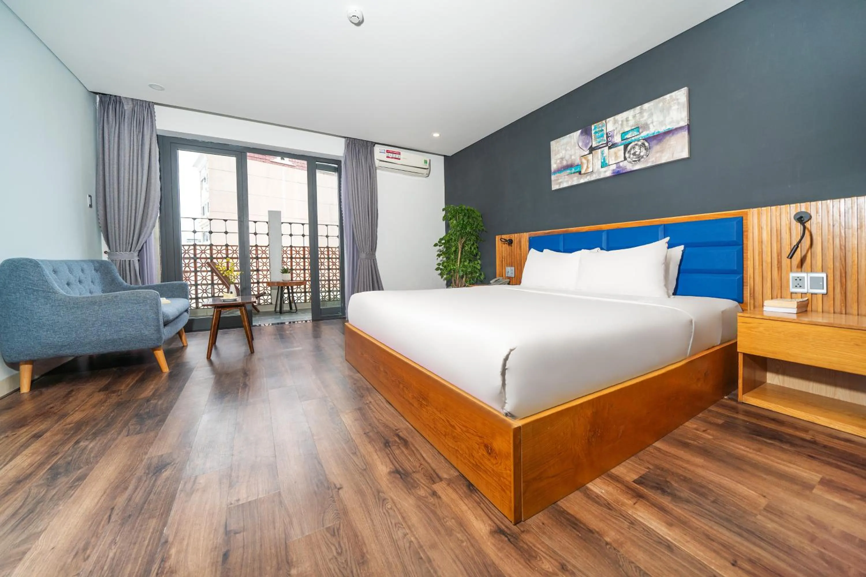 Living room, Bed in DOMA by HSuites Hotel & Apartment
