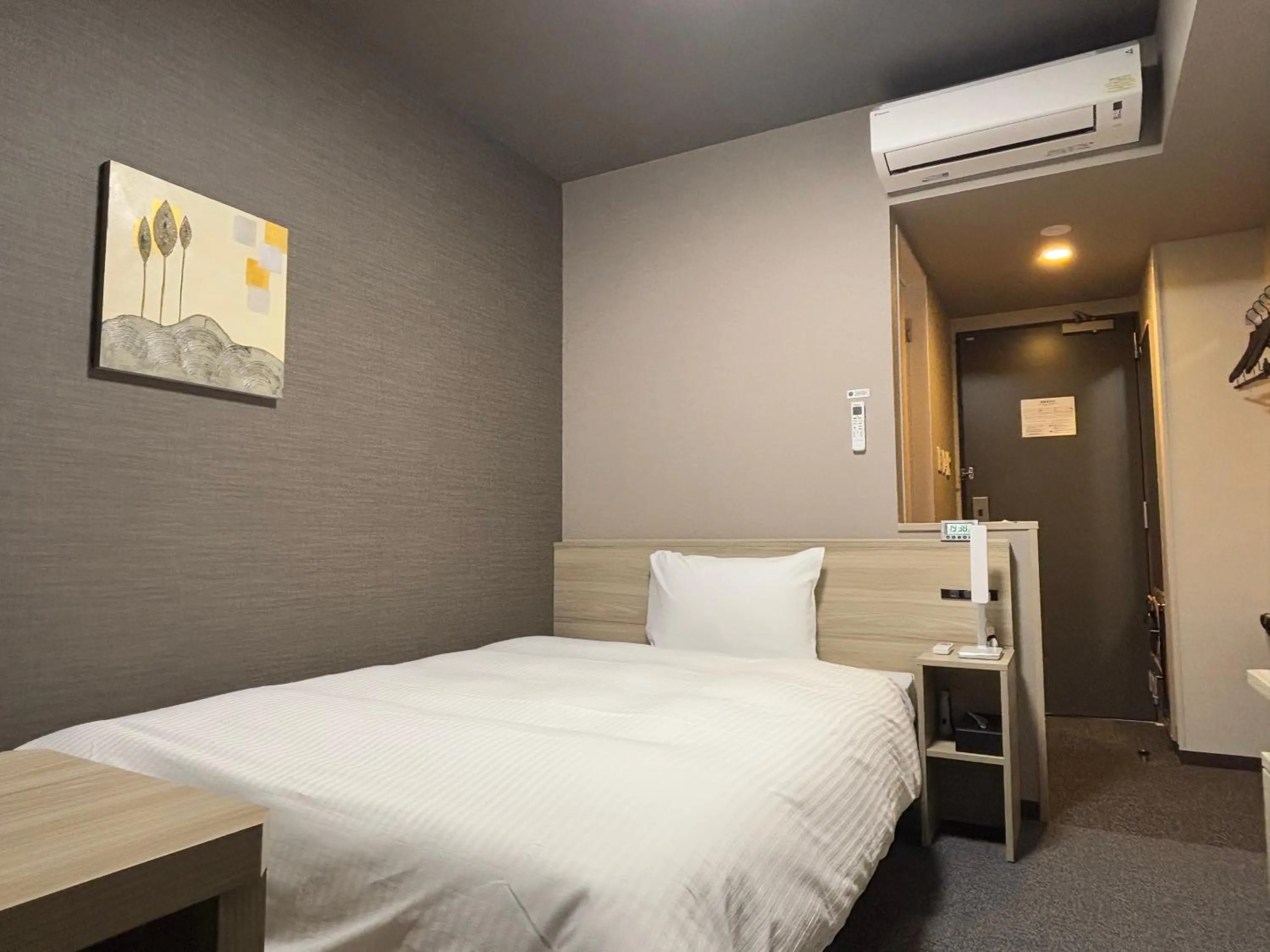 Photo of the whole room, Bed in Hotel Route Inn Okayama Maniwa