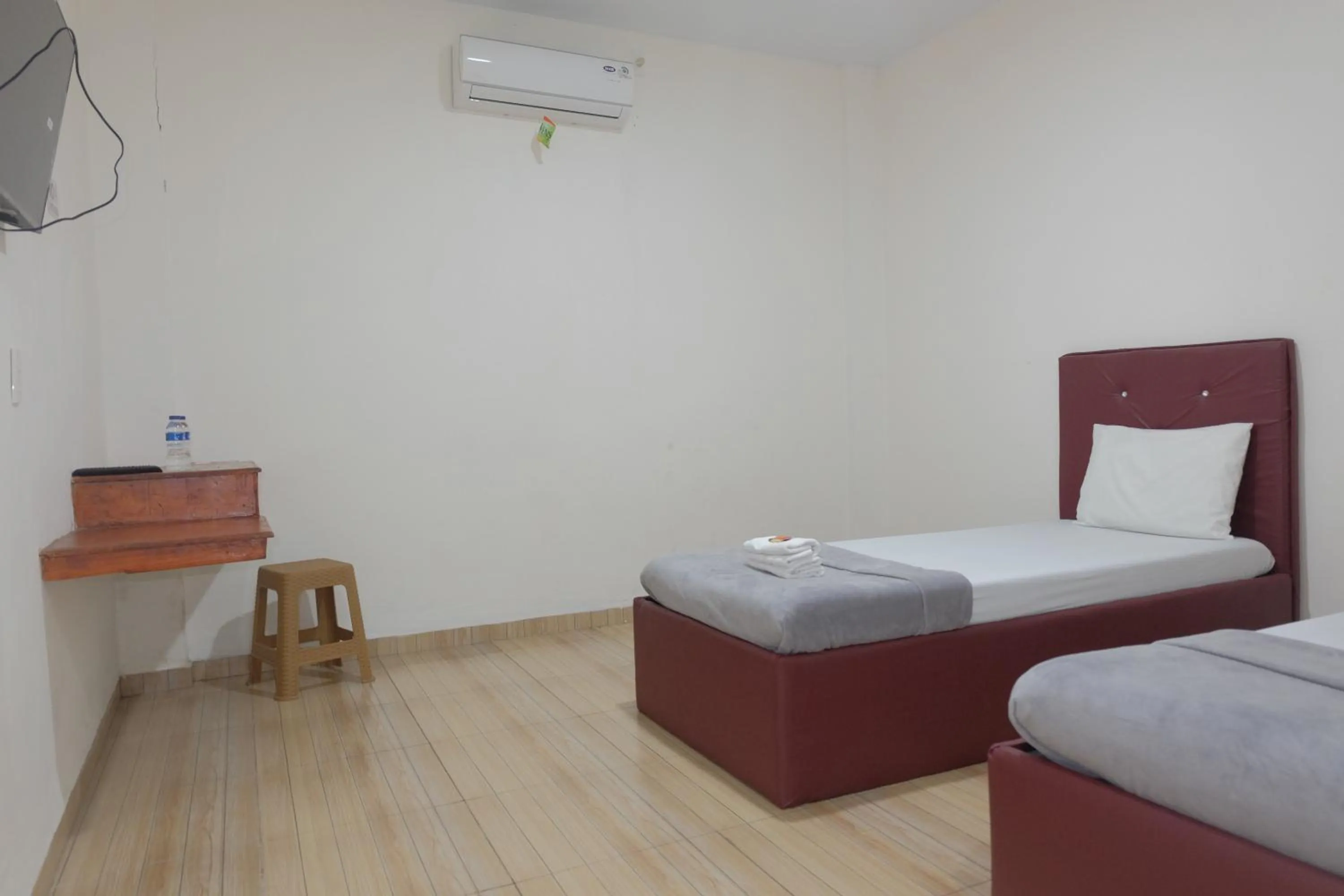 Bed in BI Hotel Kisaran