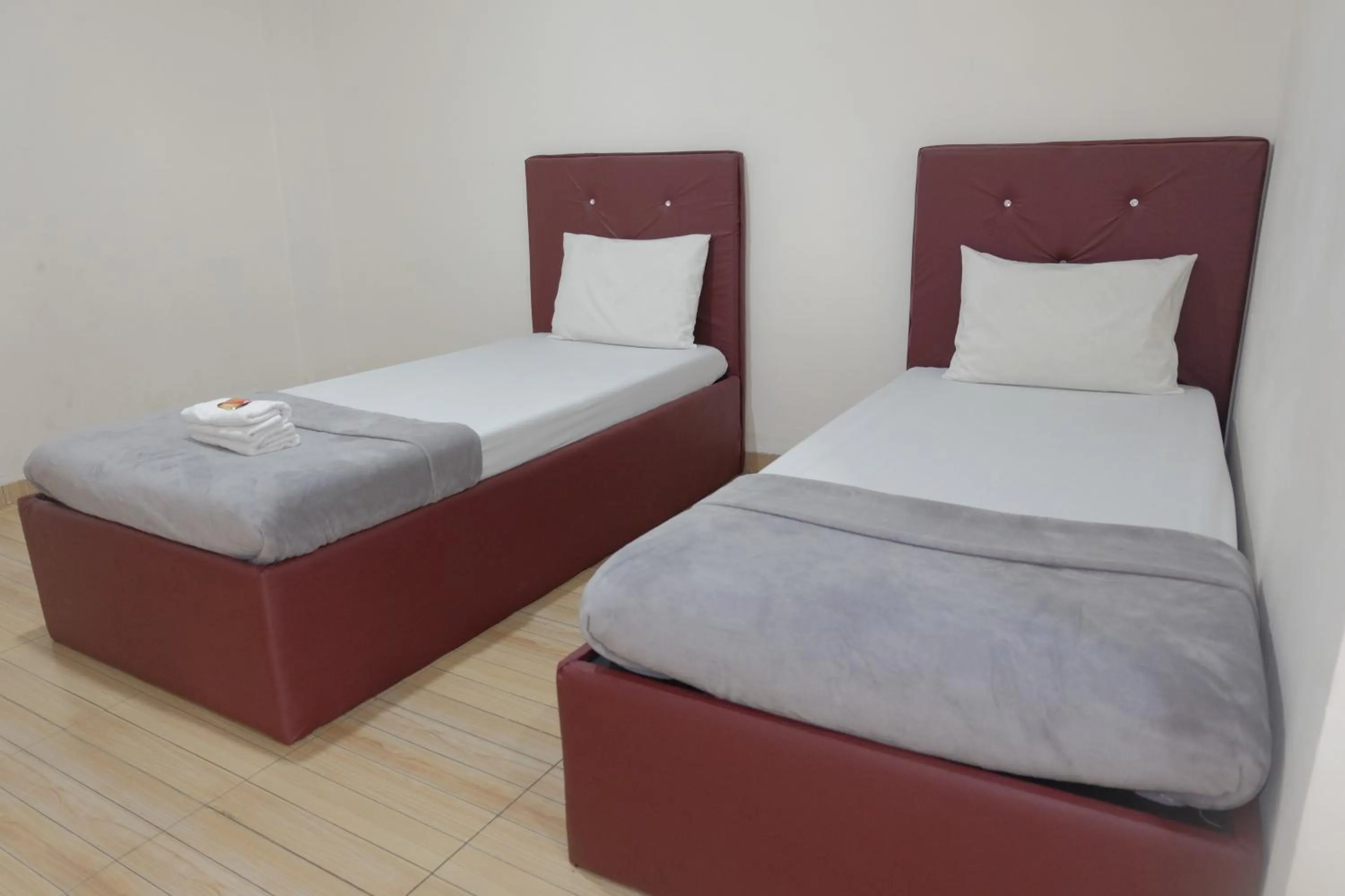 Bed in BI Hotel Kisaran