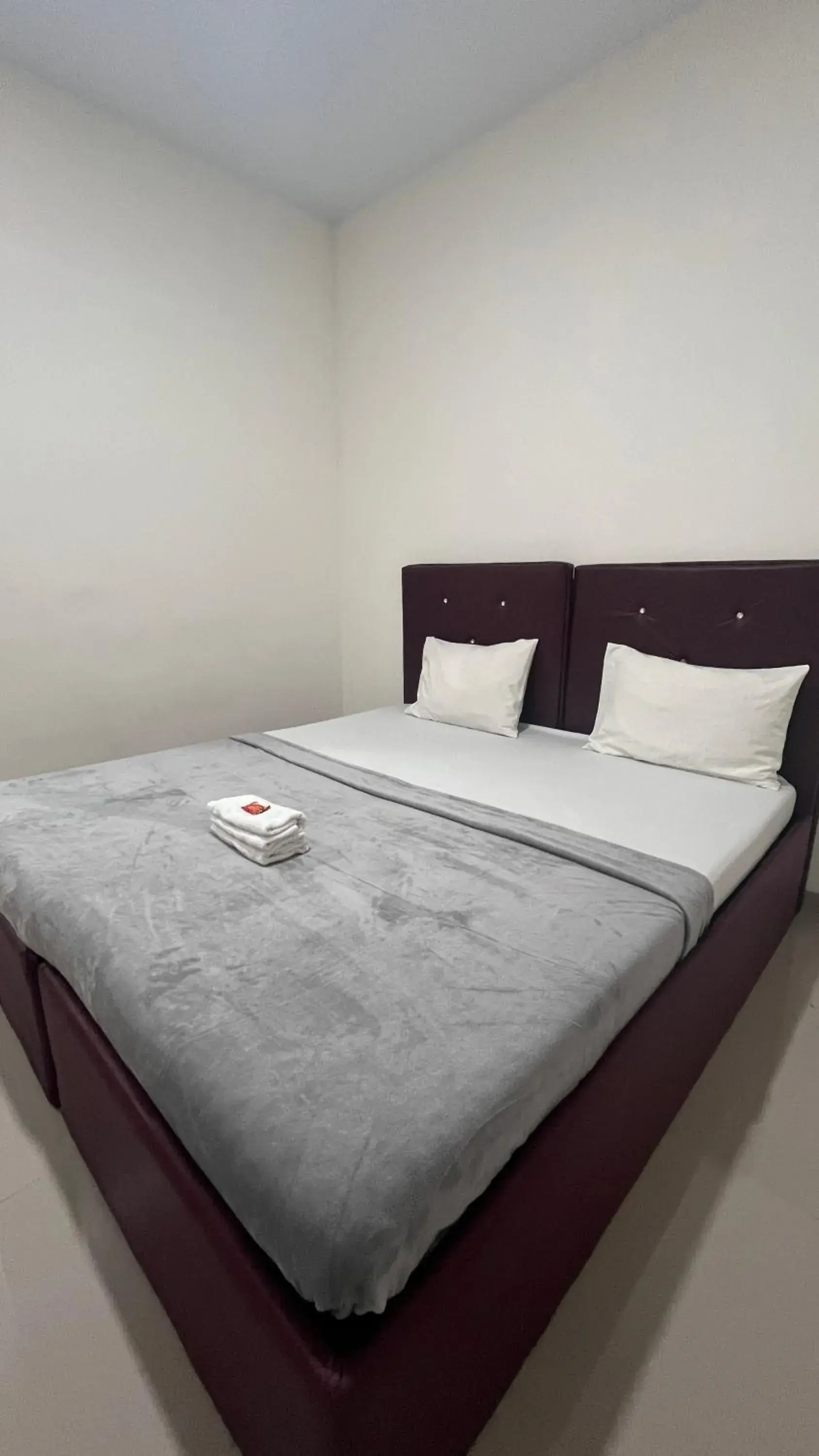 Bed in BI Hotel Kisaran Bed in BI Hotel Kisaran