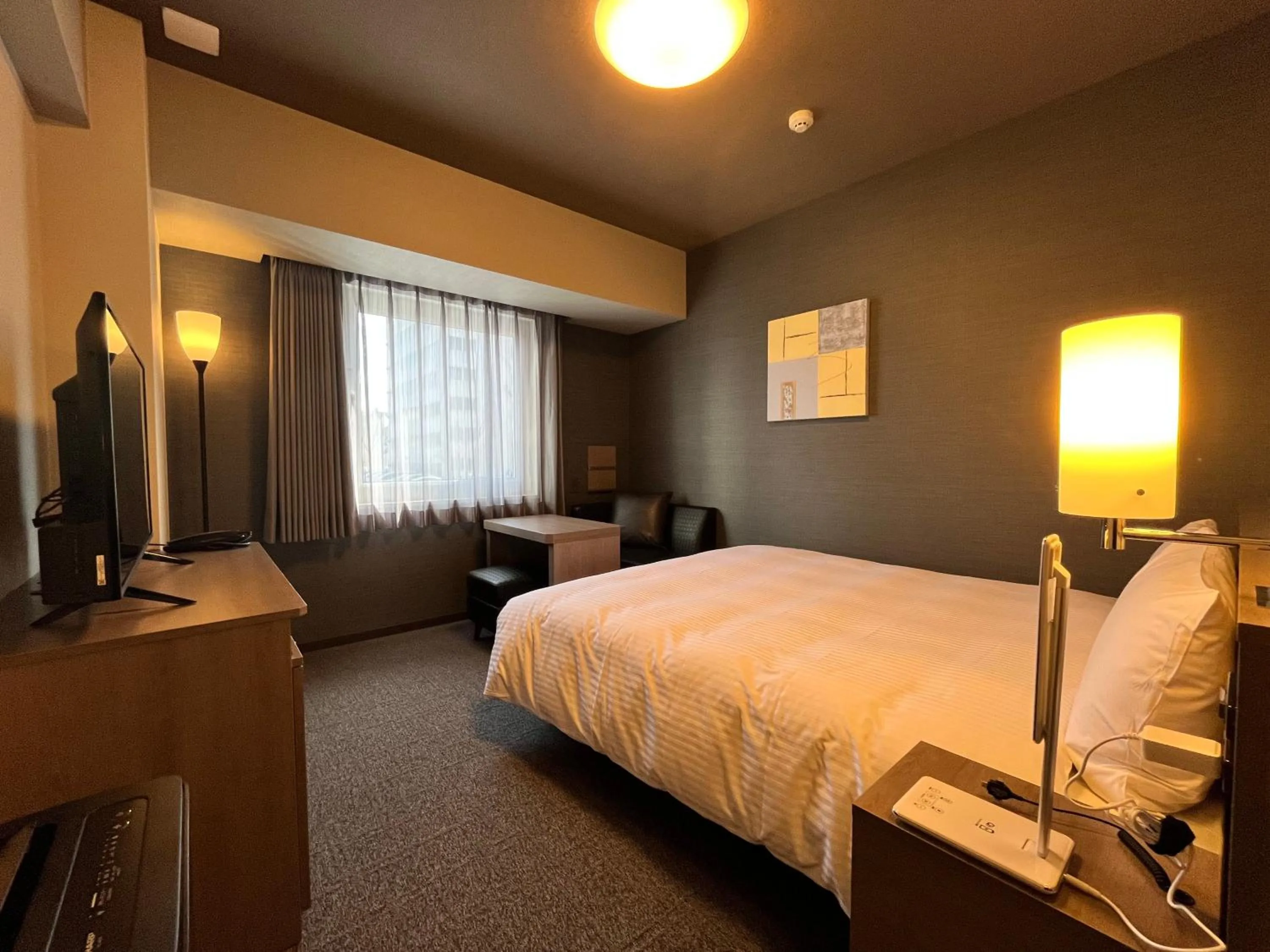 Photo of the whole room, Bed in Hotel Route Inn Grand Fukushima Ekimae Higashiguchi