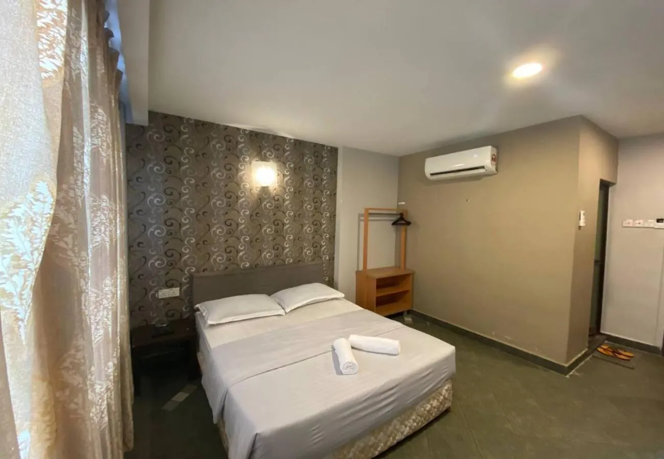 Bed in Hotel Harbour Inn