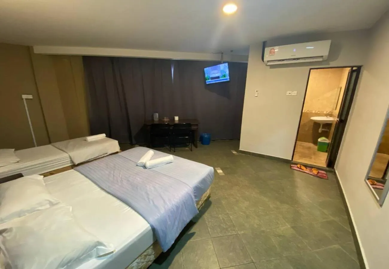 Bed in Hotel Harbour Inn