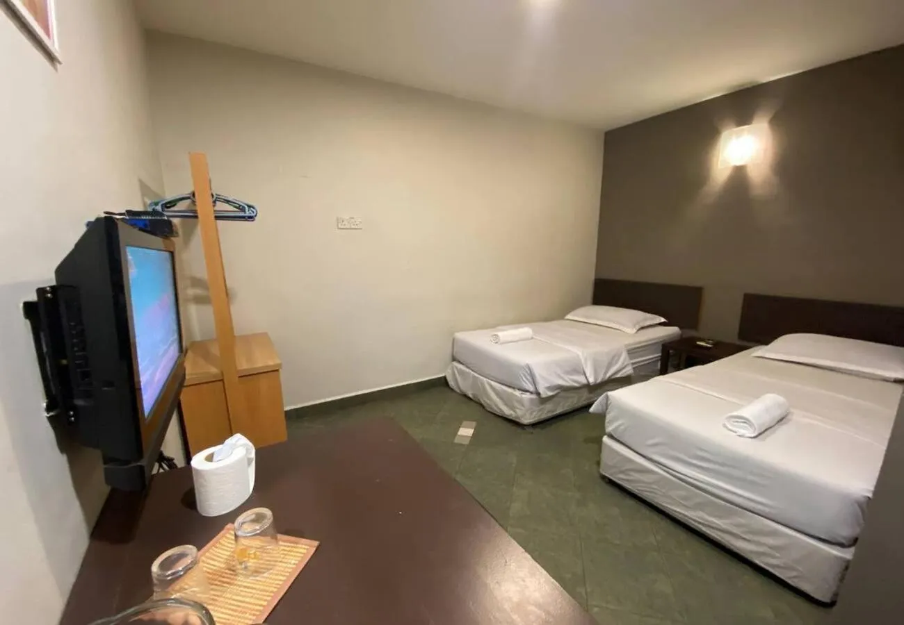 Bed in Hotel Harbour Inn