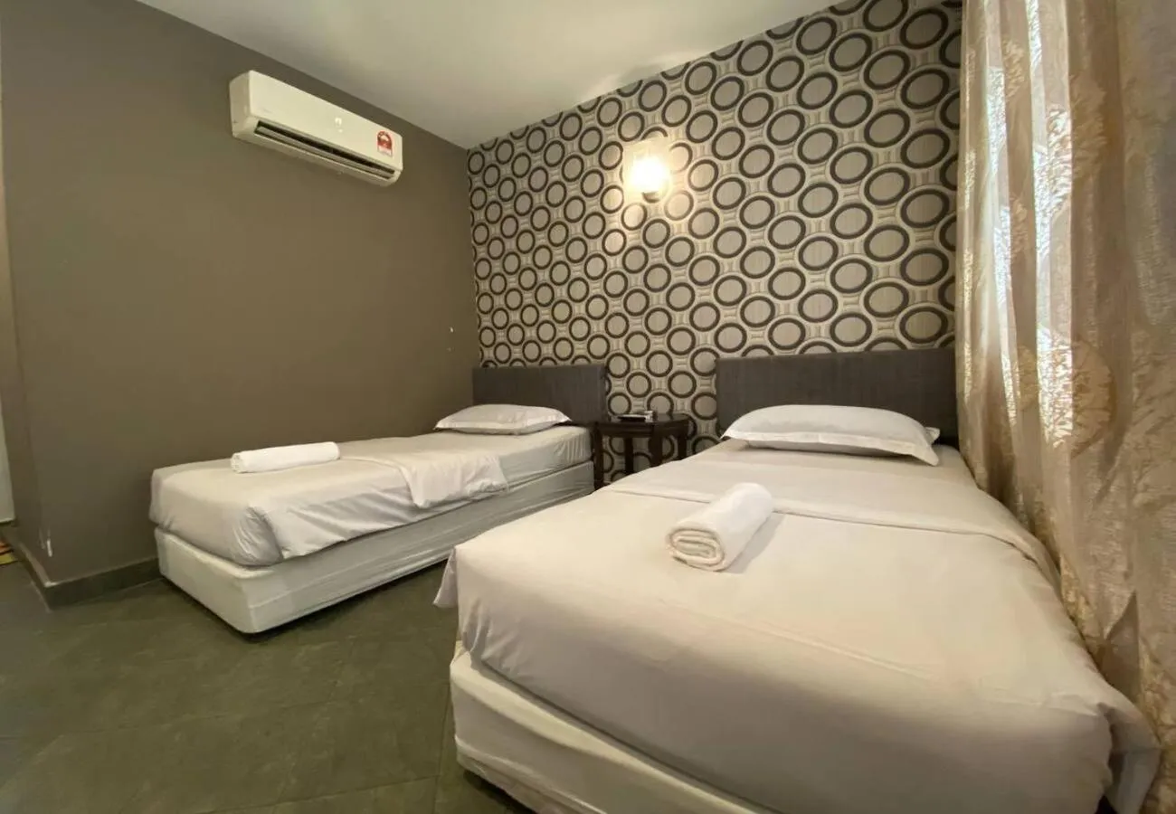 Bed in Hotel Harbour Inn